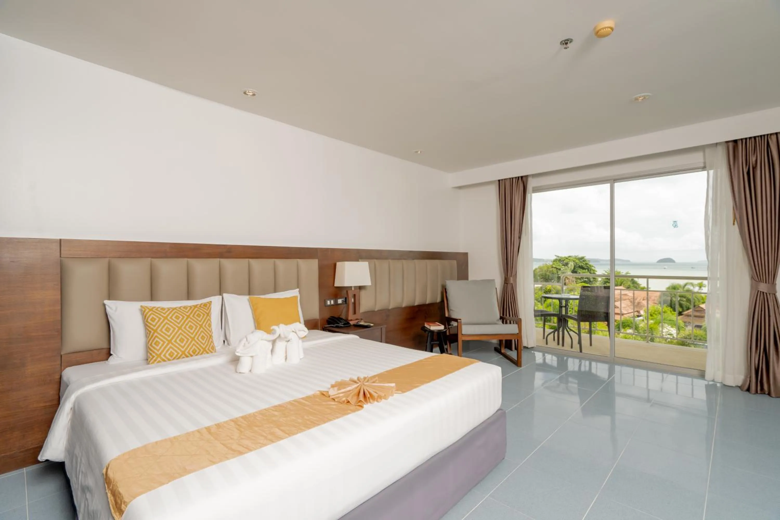 Bed in Blue Beach Grand Resort And Spa