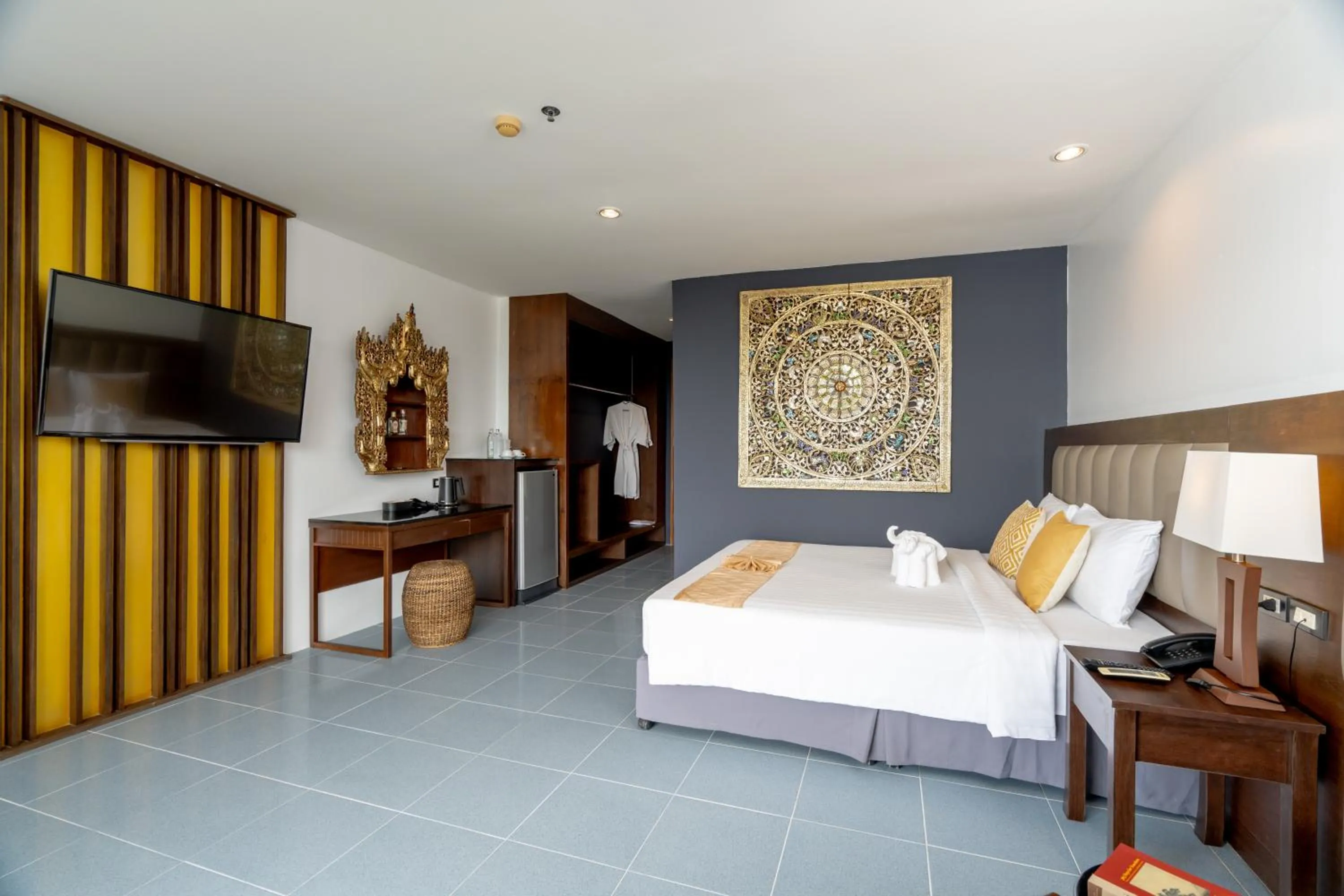 Bed in Blue Beach Grand Resort And Spa