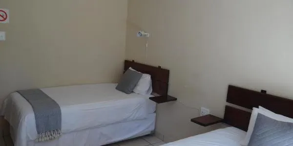 Bed in Lepha Guest House