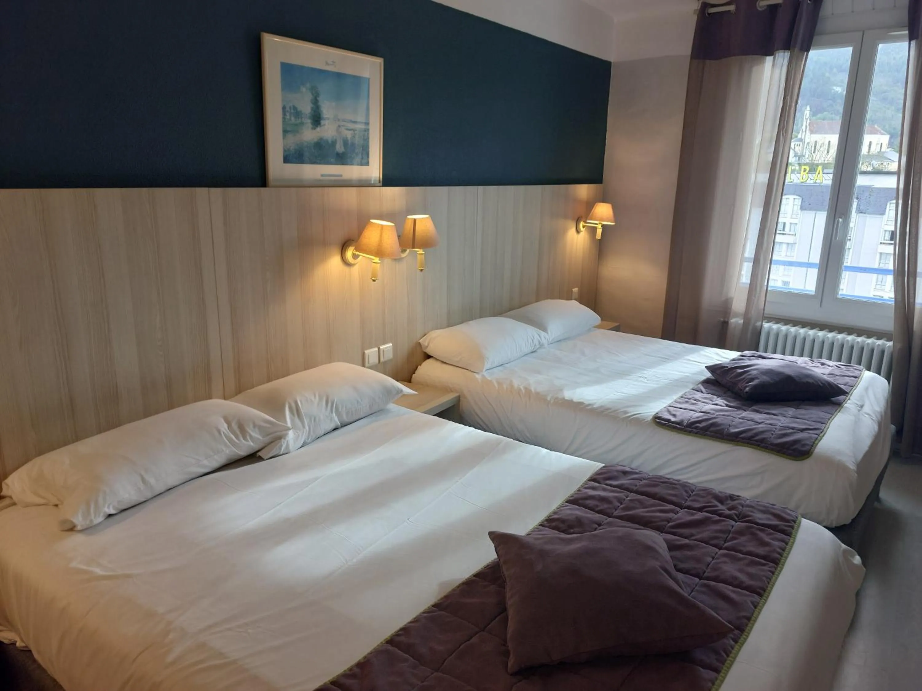 Bed in Hôtel Christina Lourdes