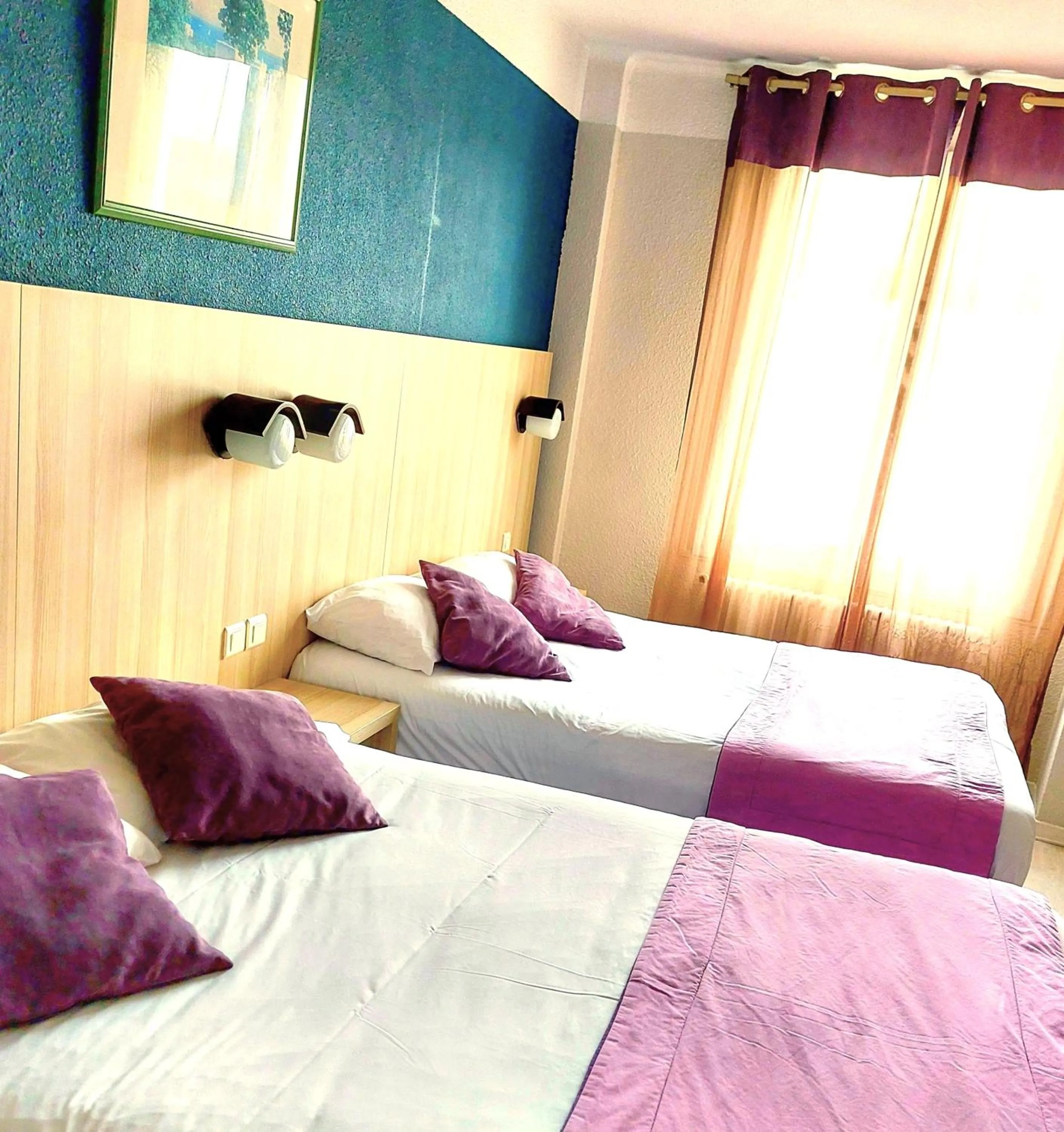 Bed in Hôtel Christina Lourdes