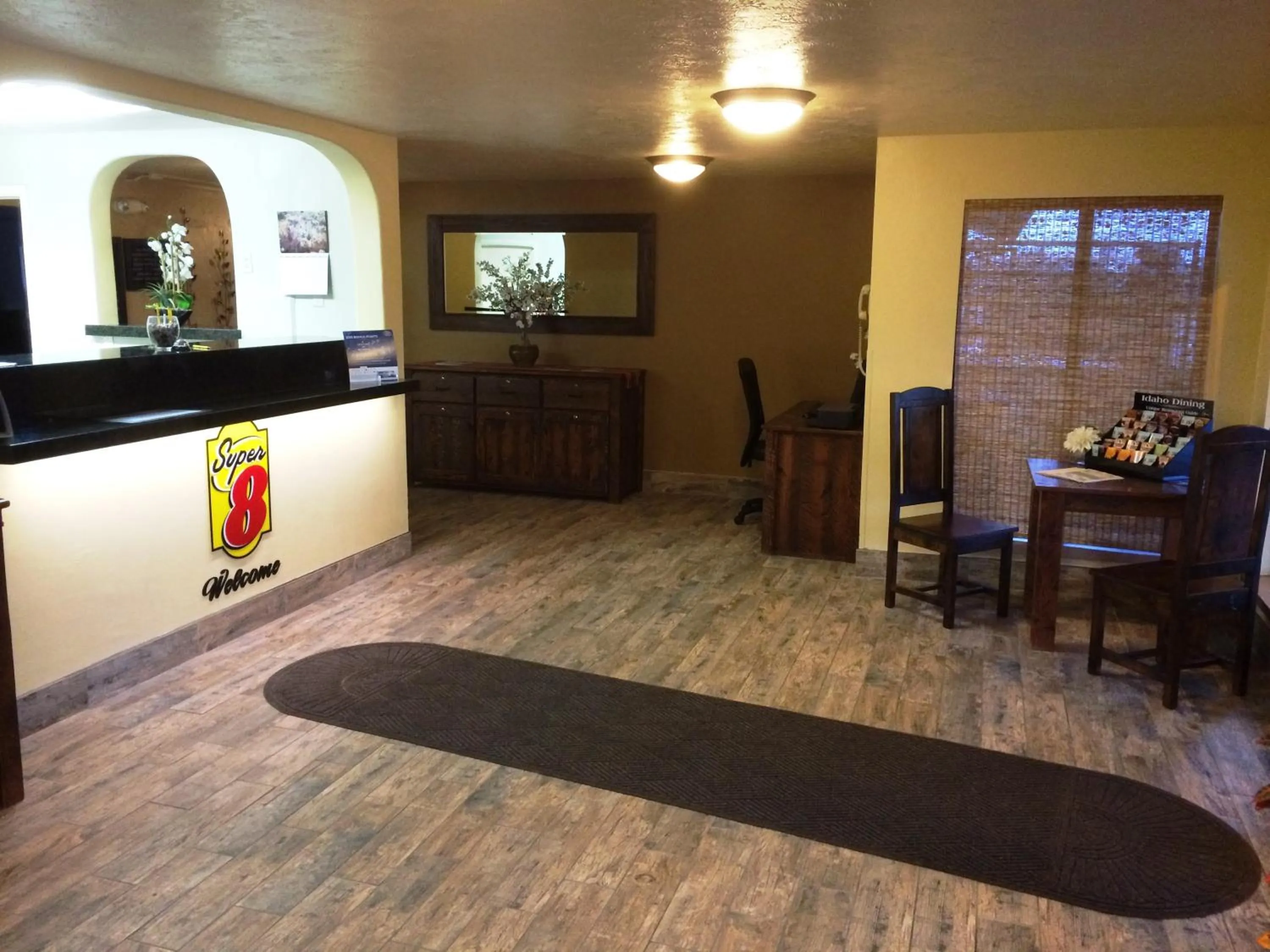 Property logo or sign in Super 8 by Wyndham Idaho Falls