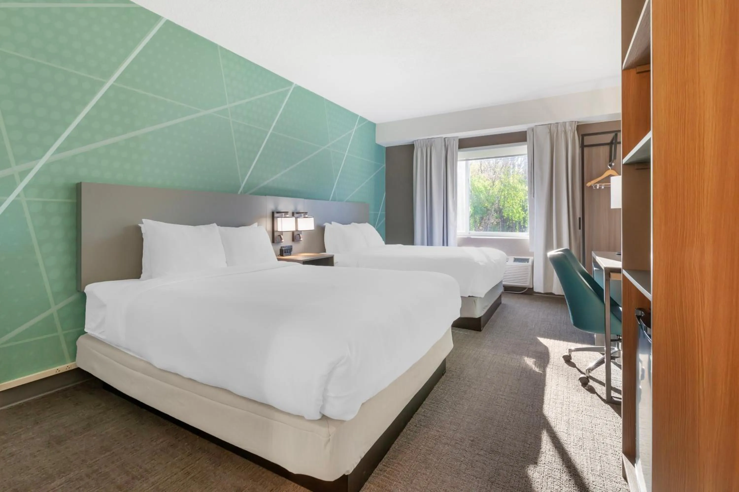 Bed in Comfort Inn & Suites Beaver Dam