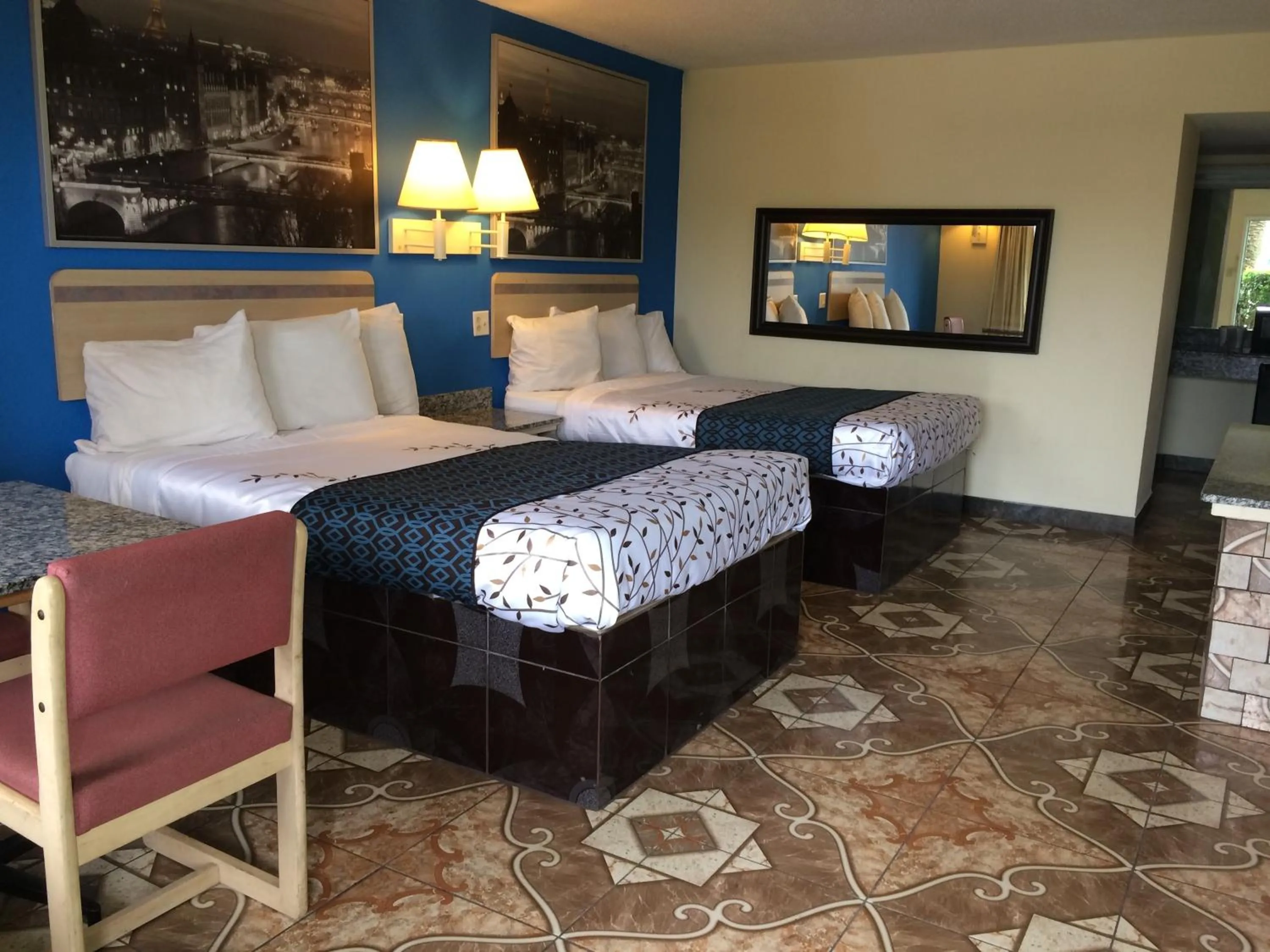 Bed in Americas Best Value Inn Beaumont