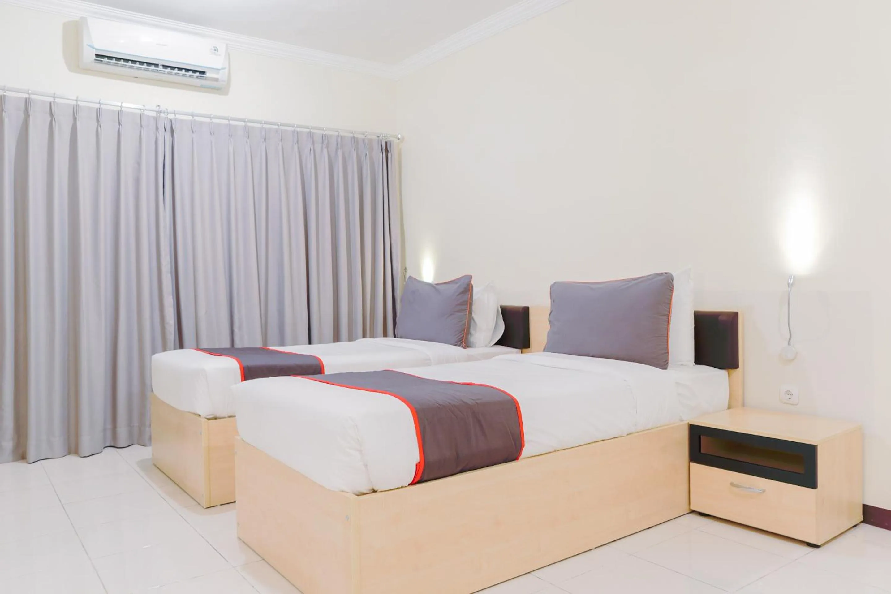 Bedroom in Collection O 6 Grand Palace Kemayoran