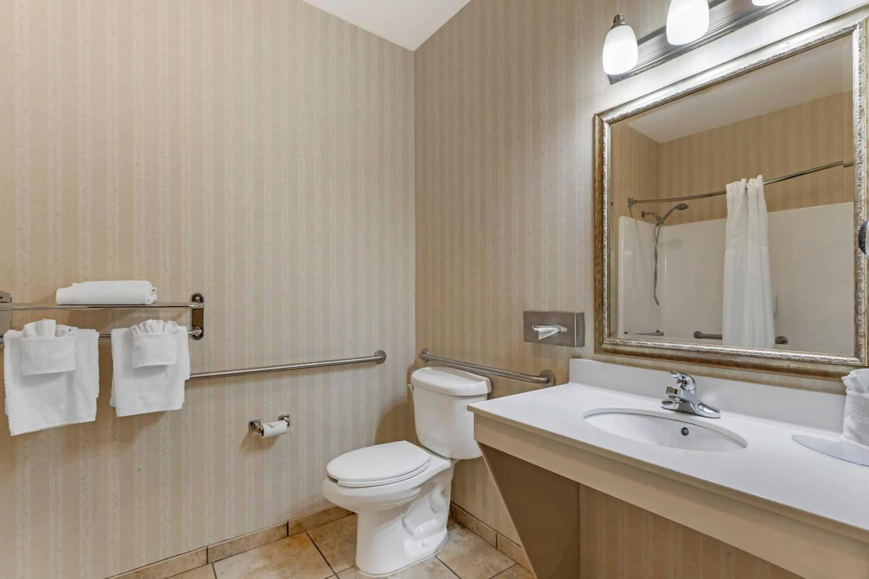 Bedroom in Quality Inn & Suites Wellington - Fort Collins