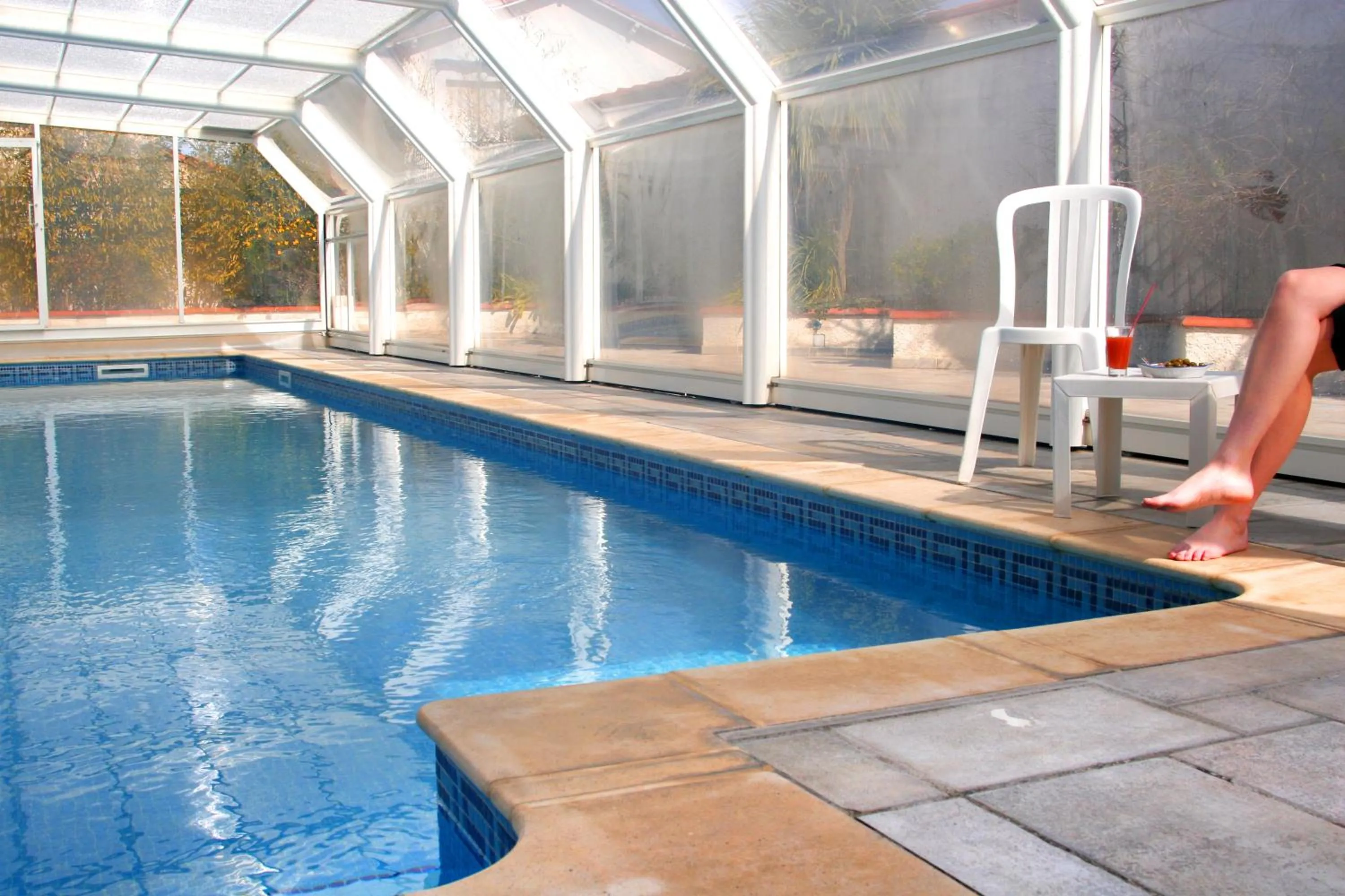 Swimming pool in Le Galion Hotel et Restaurant Canet Plage - Logis