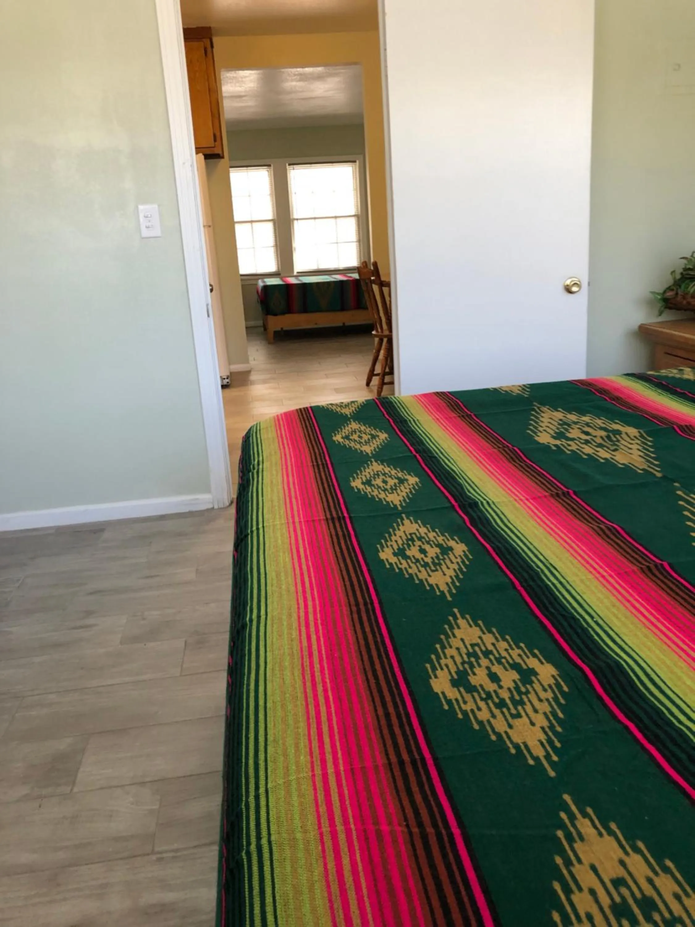 Bed in Sunset Inn and Suites