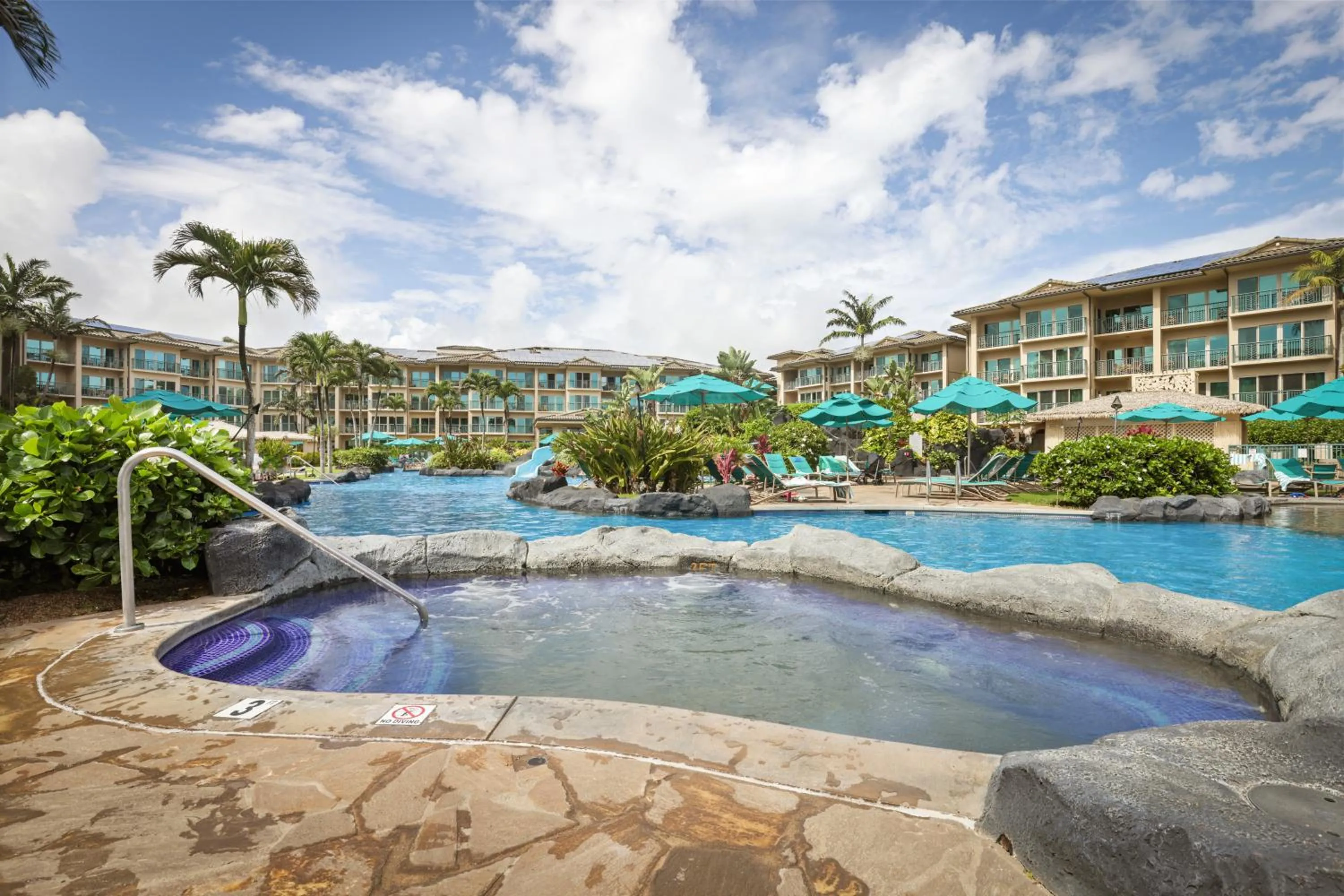 Swimming pool in Waipouli Beach Resort and Spa Kauai by OUTRIGGER
