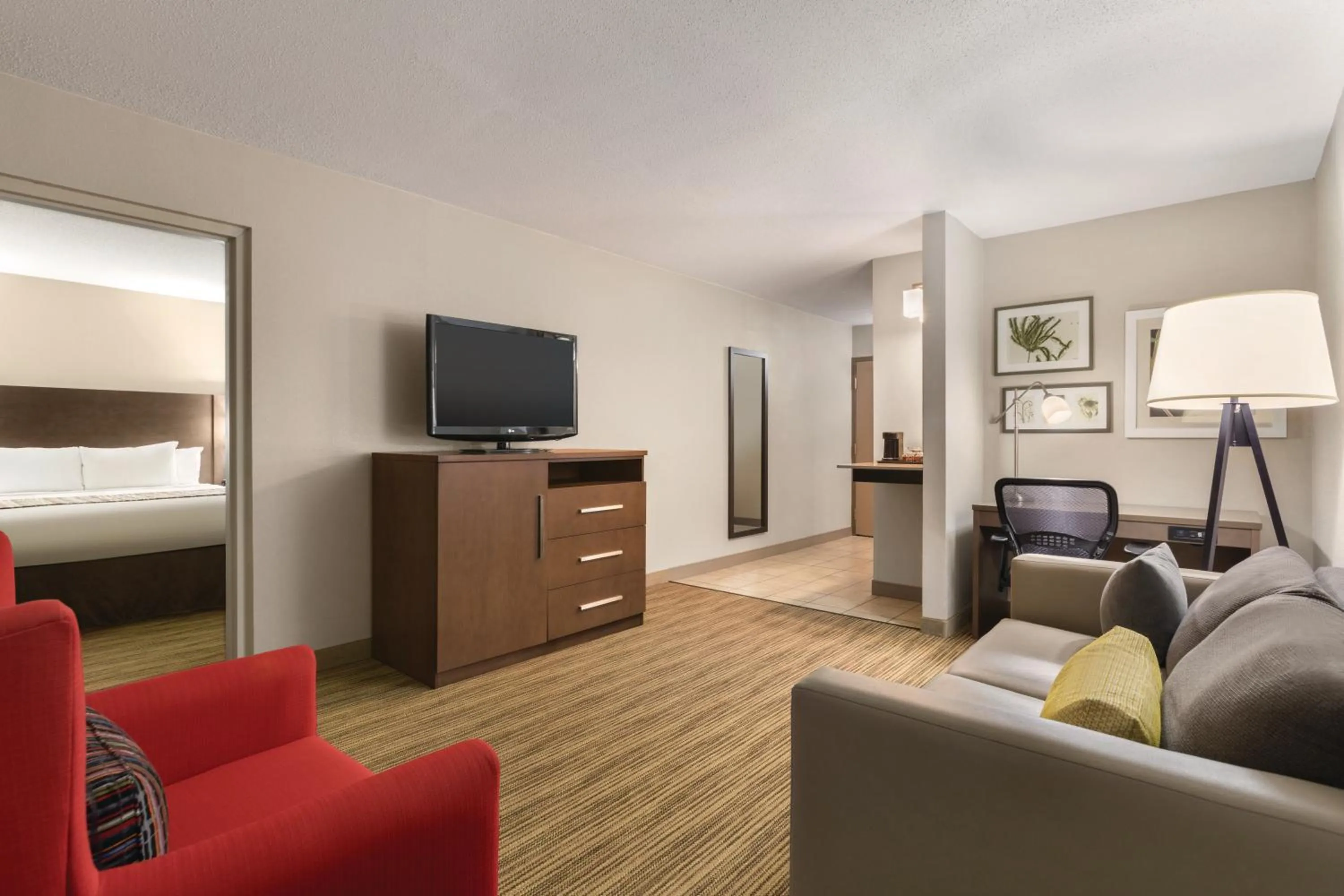 Communal lounge/ TV room, Bed in Country Inn & Suites by Radisson, Fergus Falls, MN