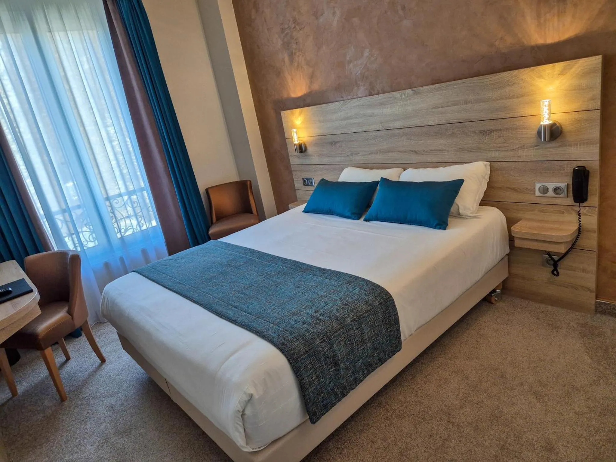 Bed in Hotel Champerret Elysees