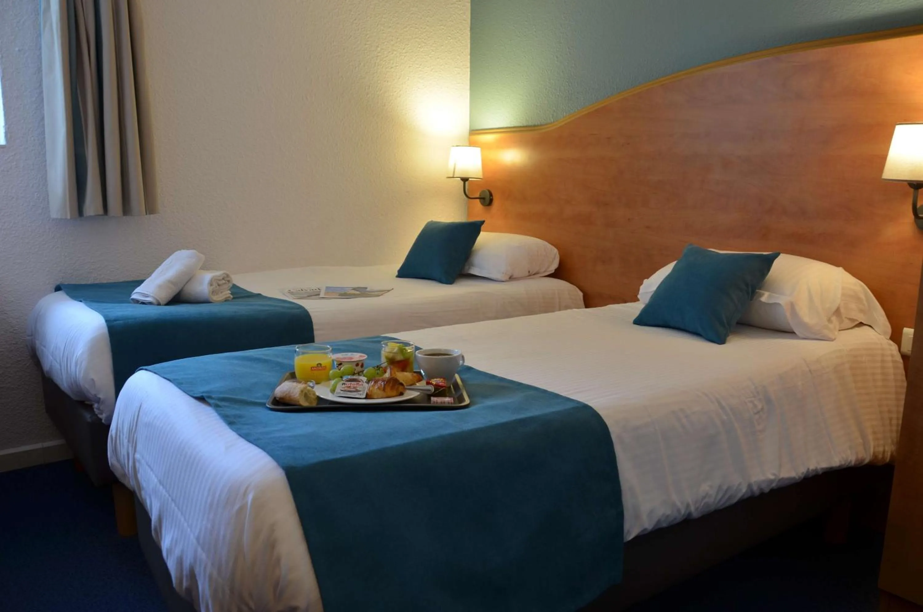 Bedroom, Bed in BRIT HOTEL Caen Hérouville