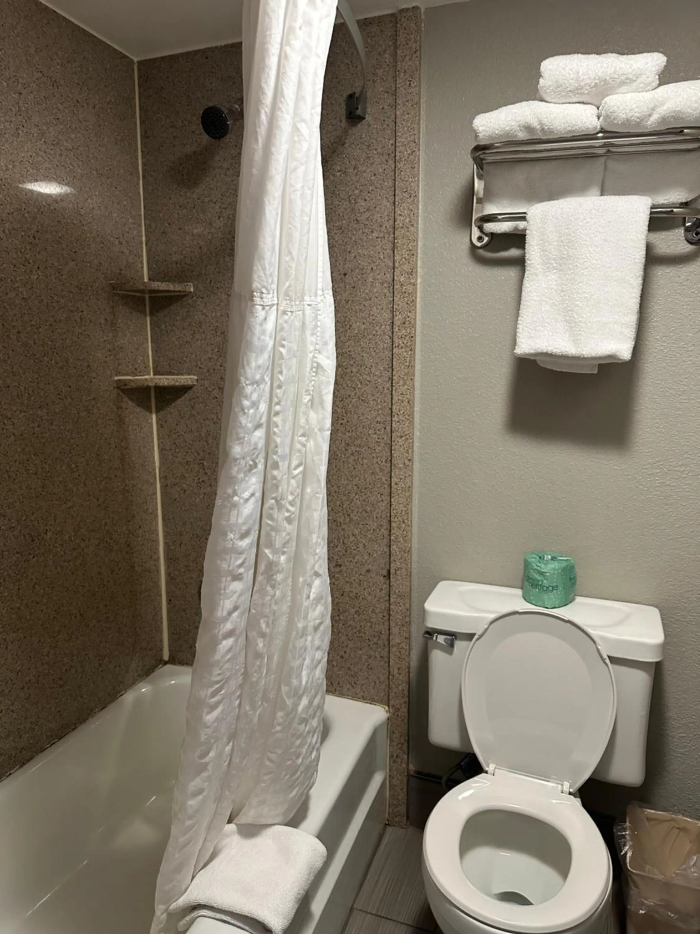 Bathroom in Days Inn & Suites by Wyndham Downtown Gatlinburg Parkway