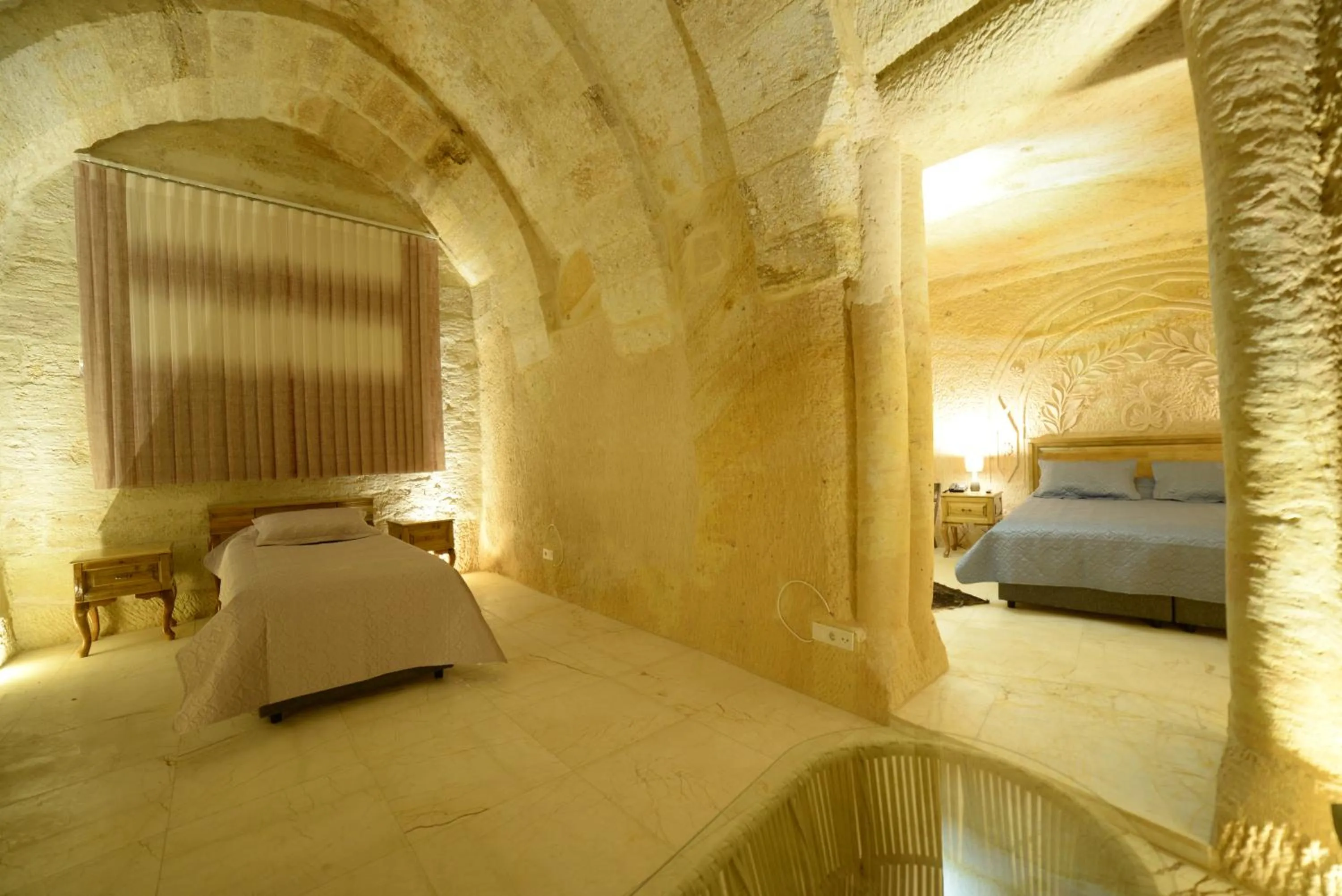 Bed in Crassus Cave Hotel