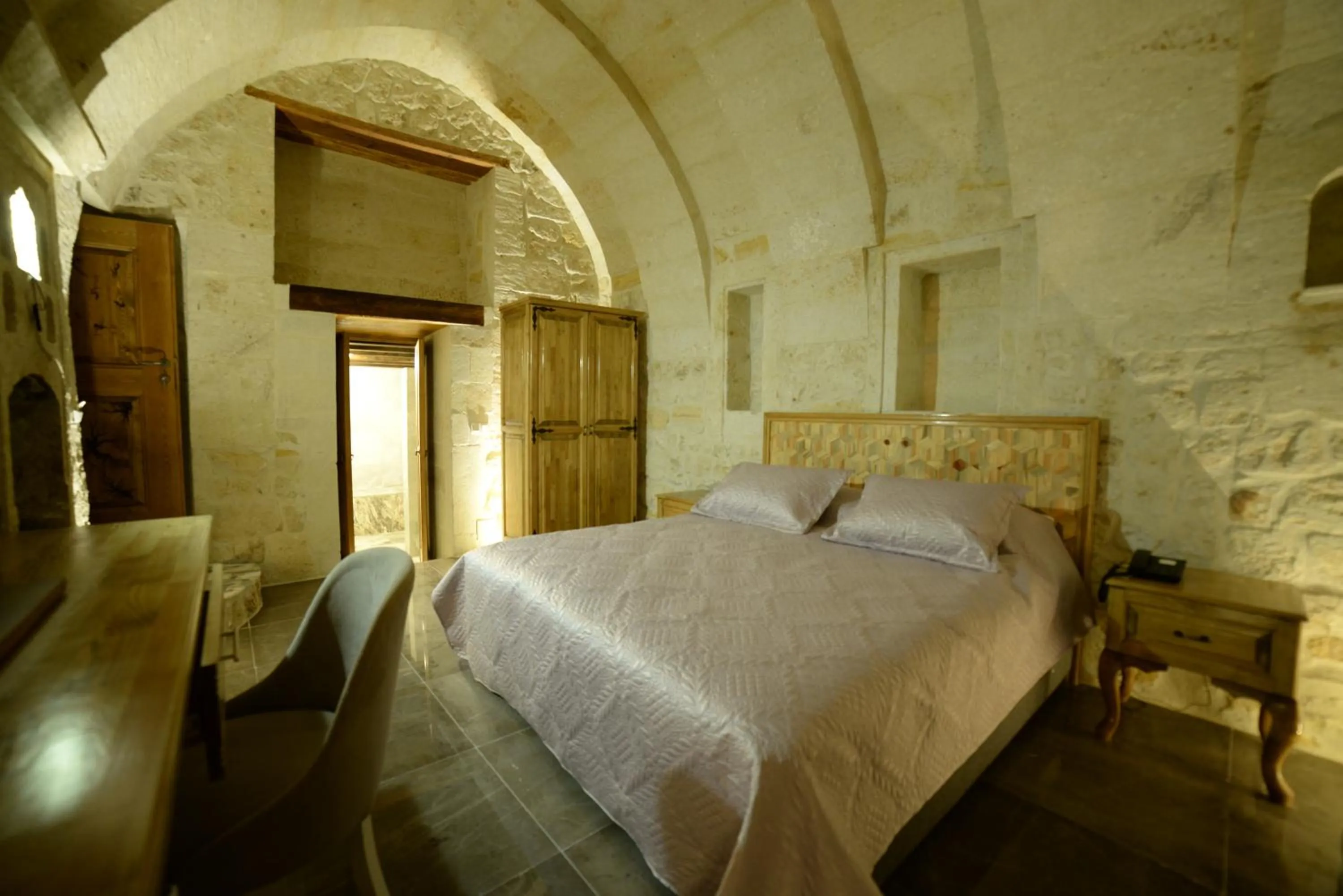 Bed in Crassus Cave Hotel
