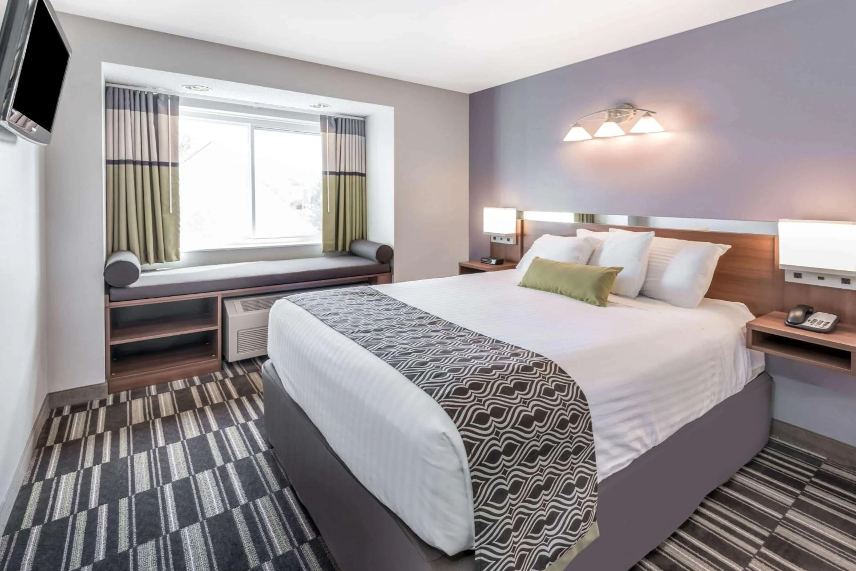 Photo of the whole room, Bed in Microtel By Wyndham Victor