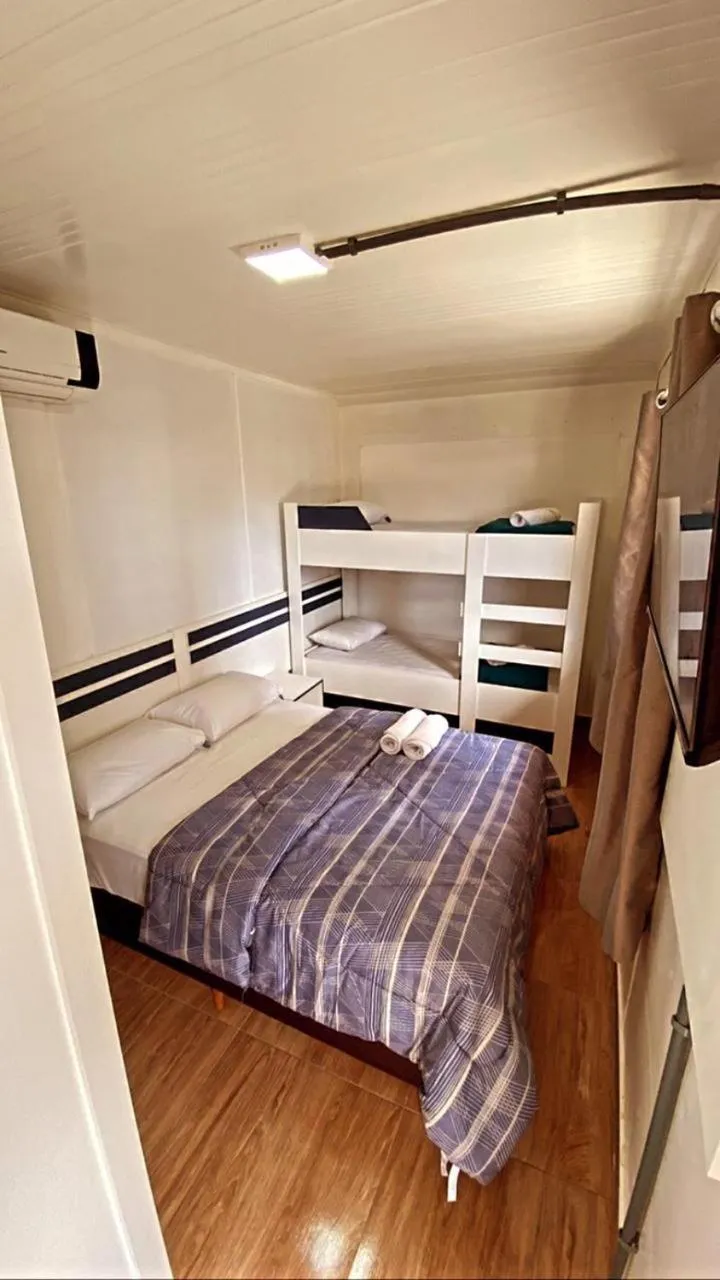 Bed in Pousada Coração do Parque