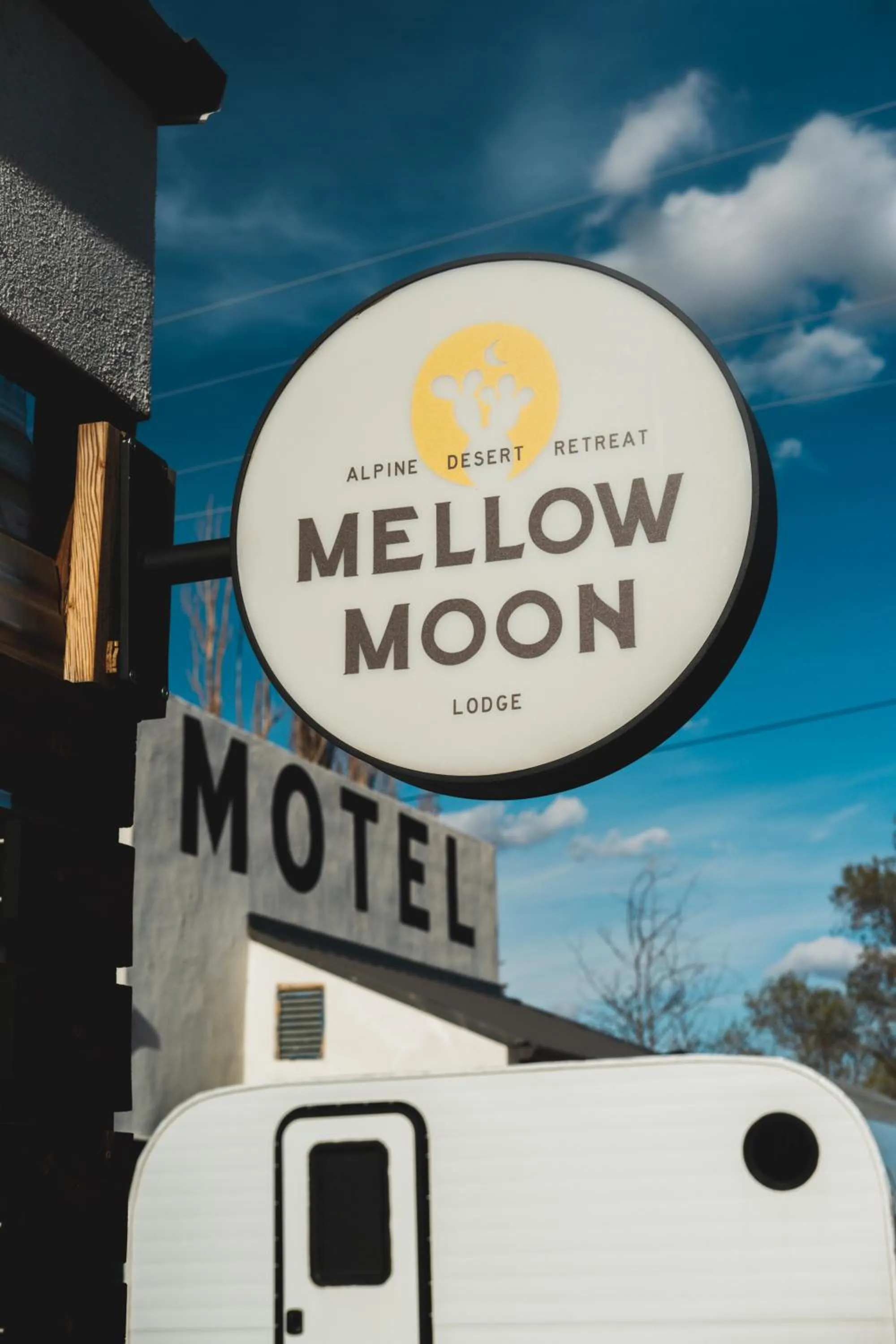 Property logo or sign in Mellow Moon Lodge