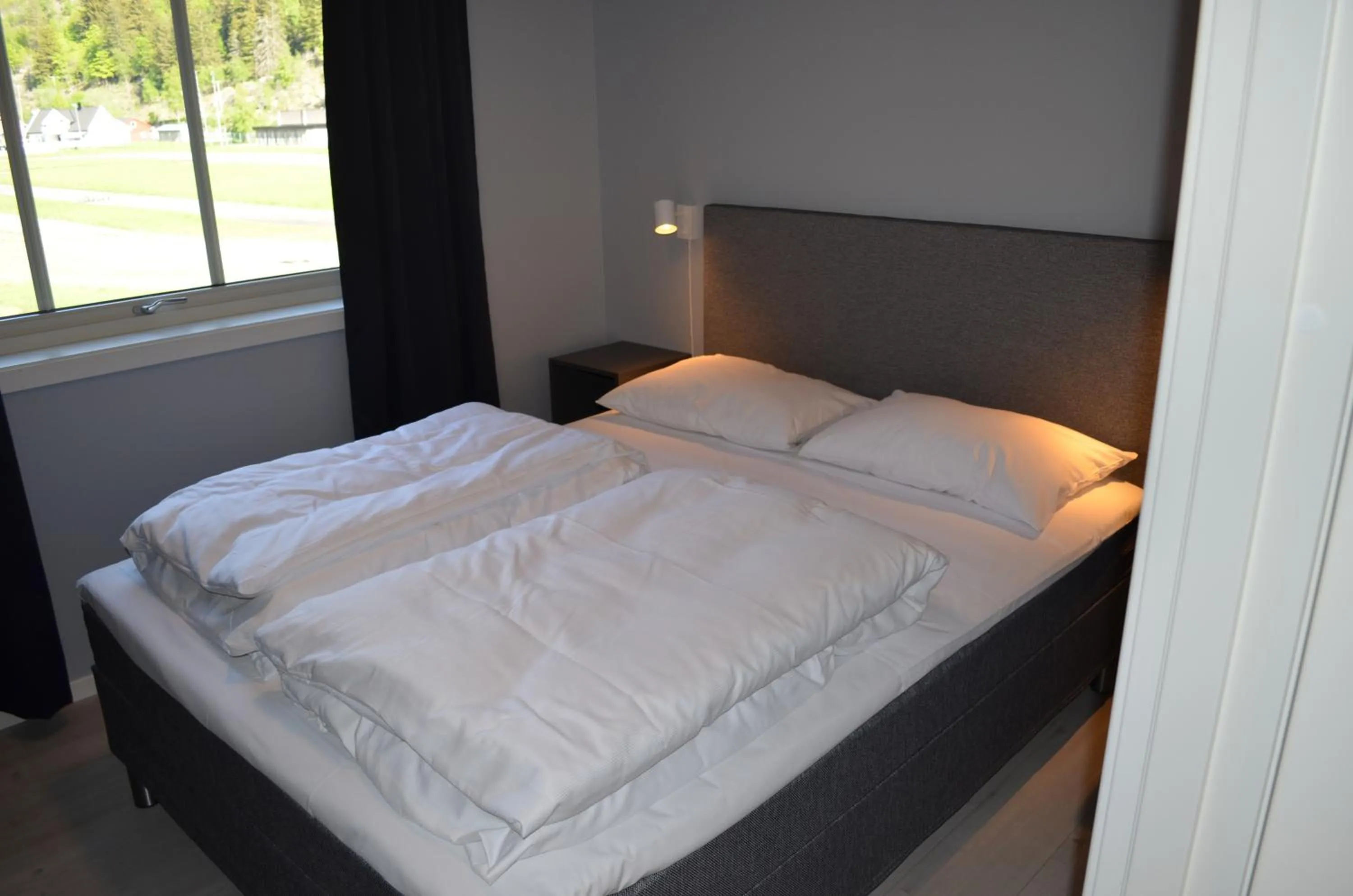 Bed in Einemo Apartments