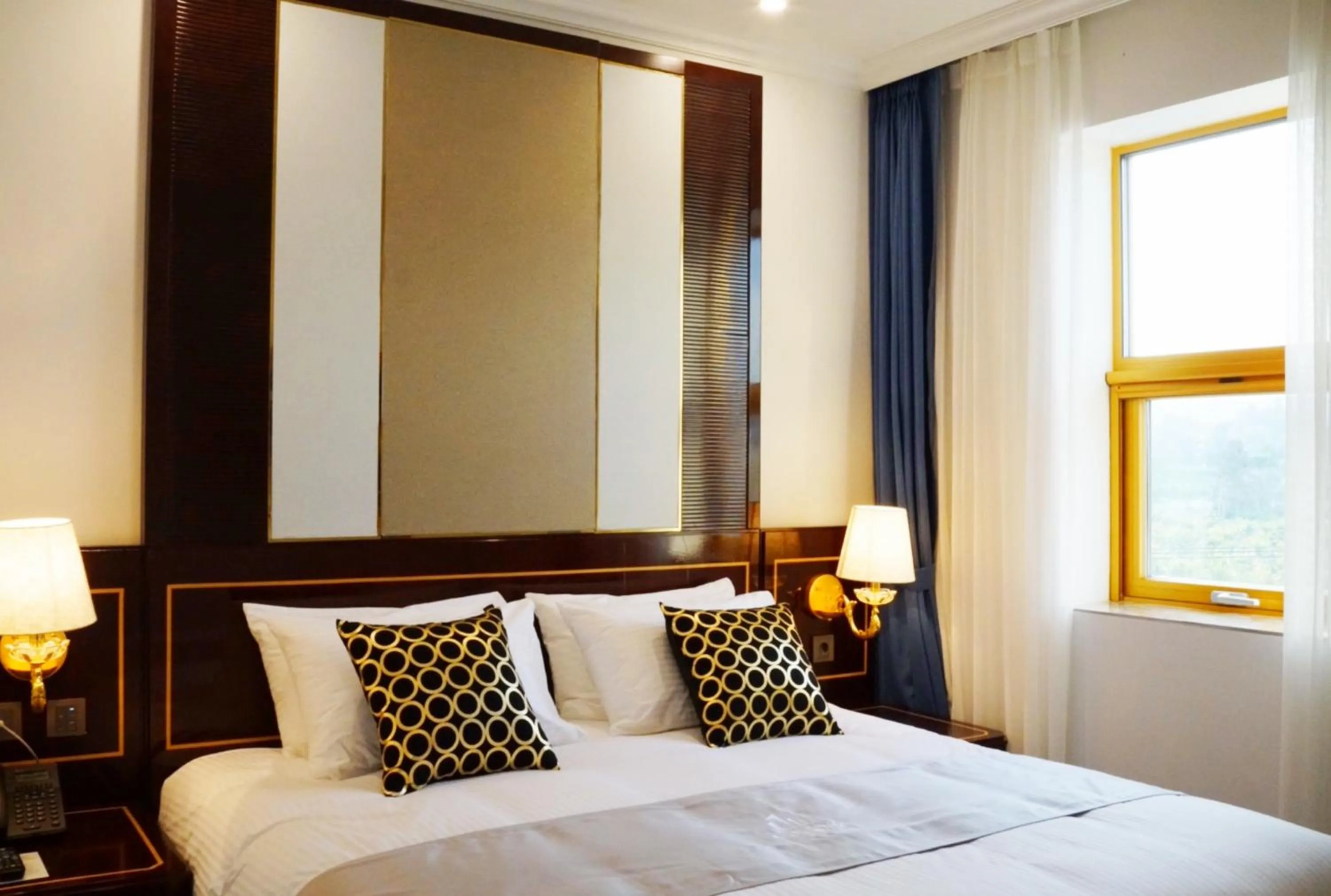 Bedroom, Bed in GoldOne Hotel & Suites