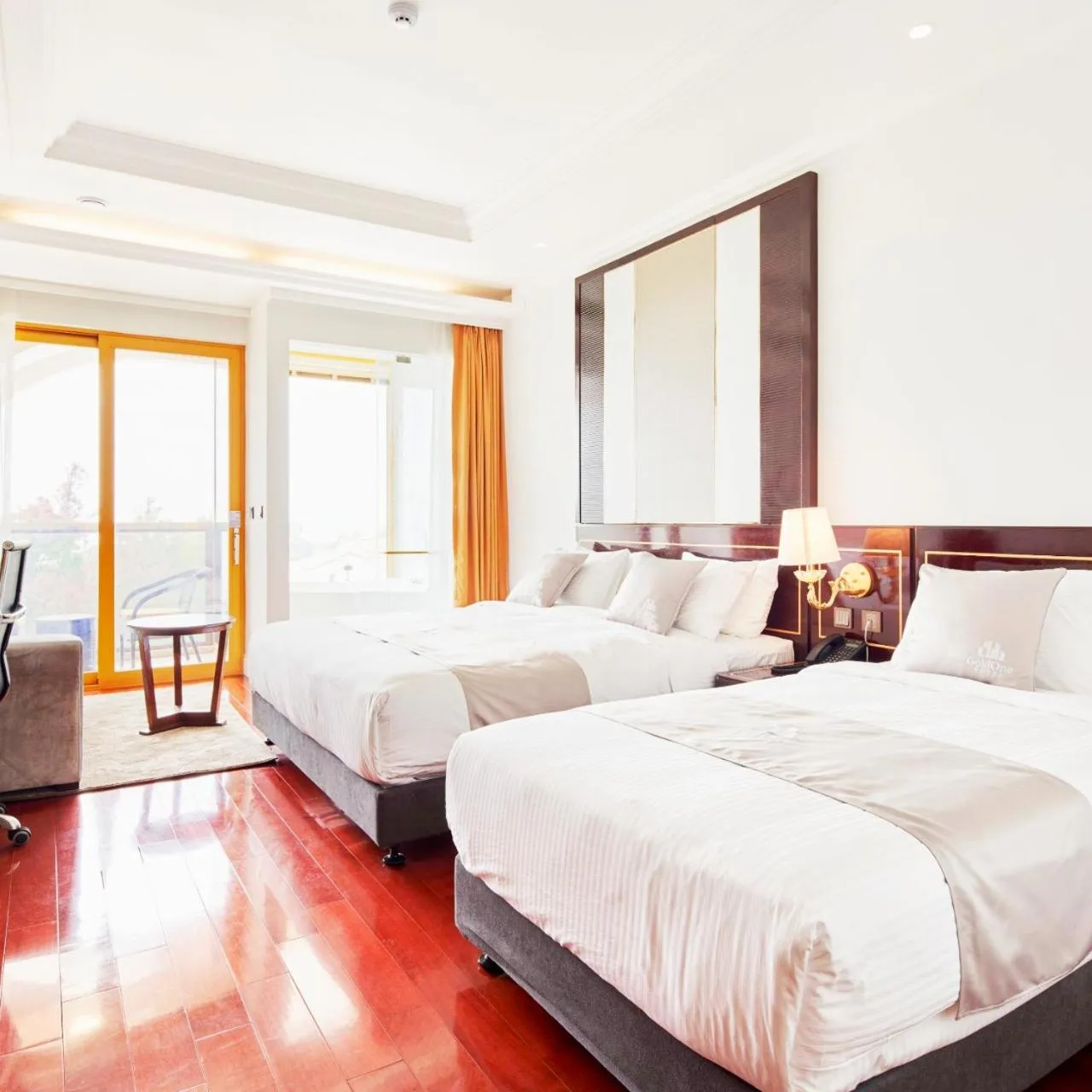 Bed in GoldOne Hotel & Suites