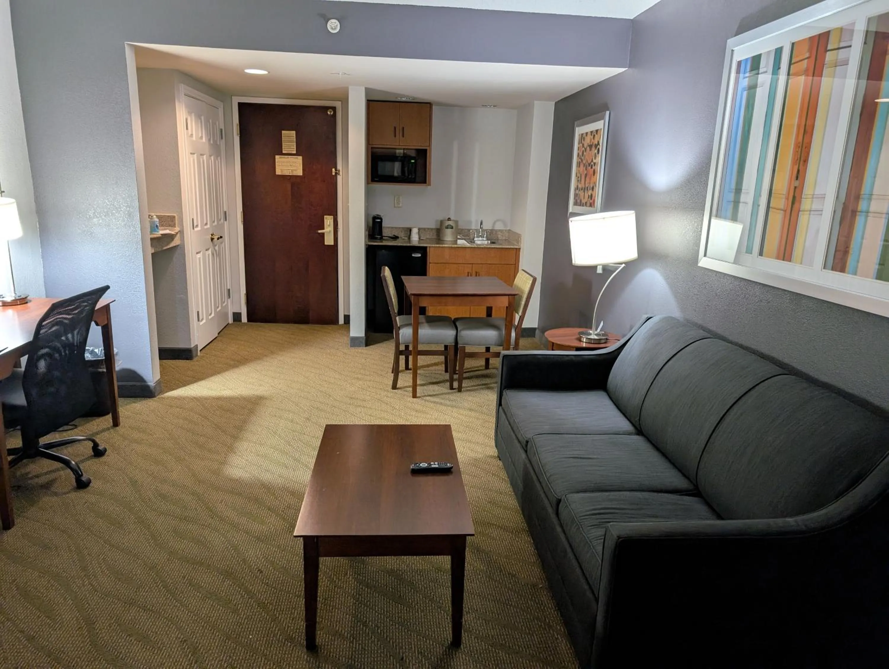 Living room in Wingate by Wyndham Chesapeake