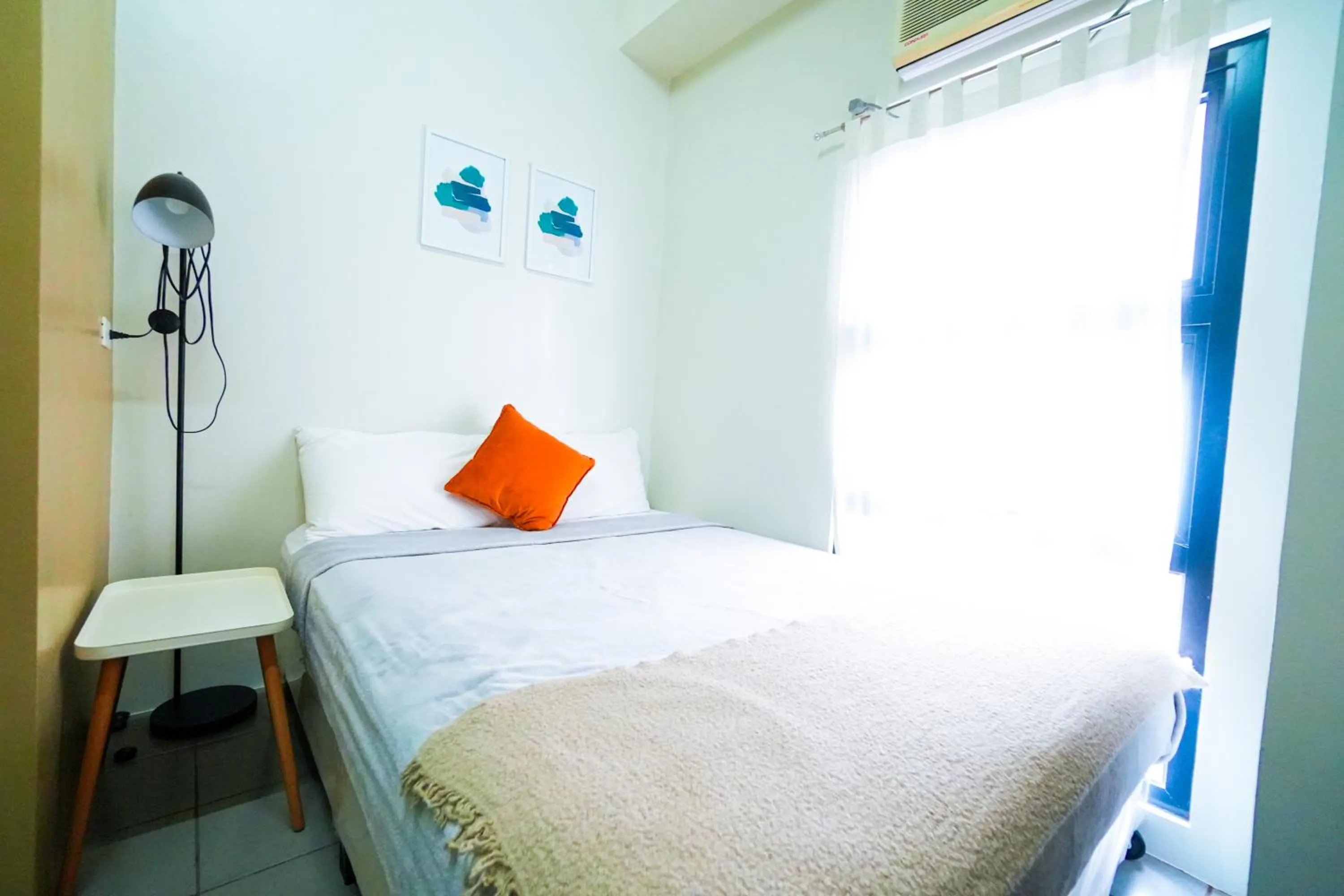 Bed in The City Flats Amorsolo