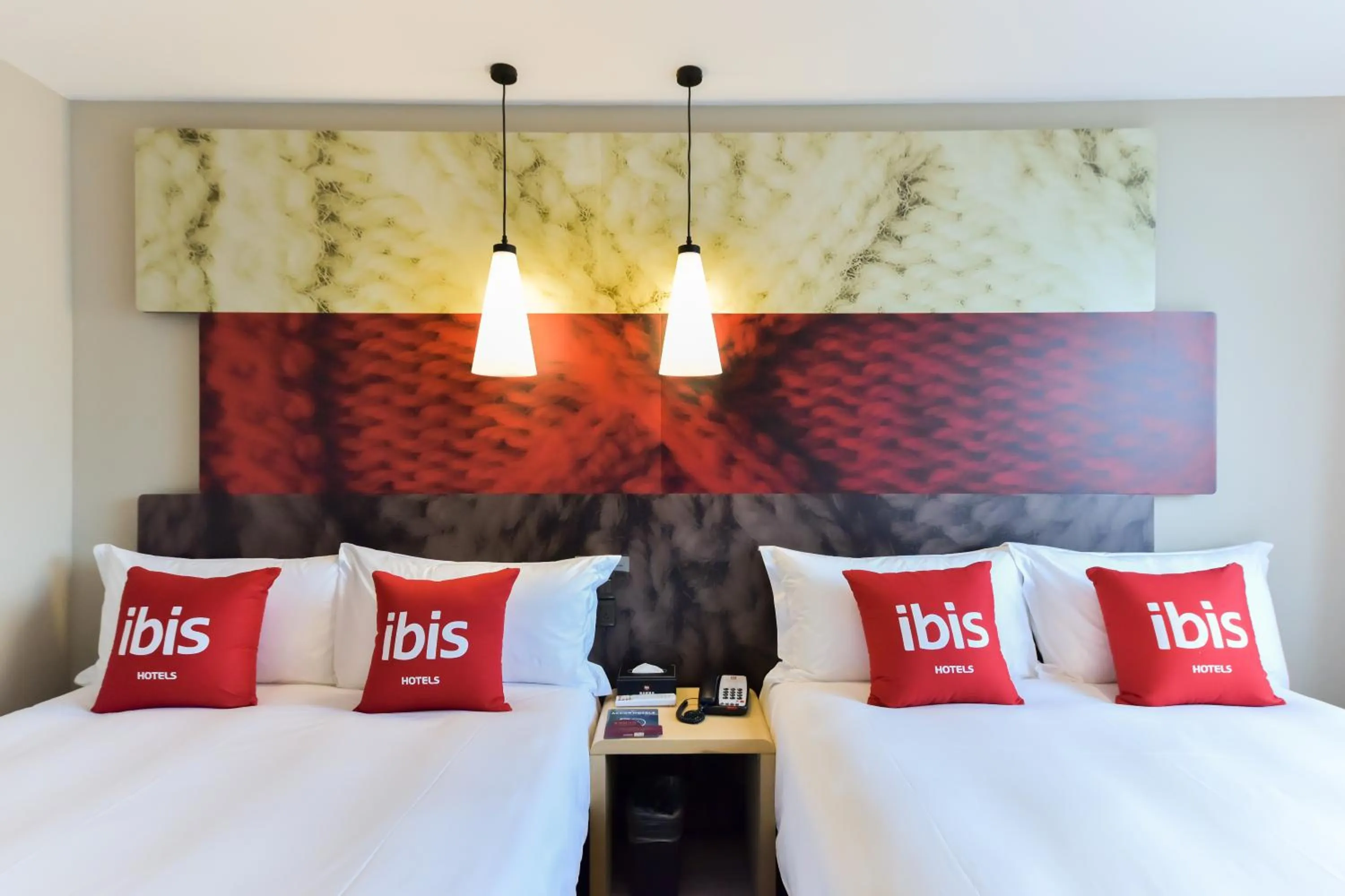 Bed in Ibis Guangzhou Pazhou International Exhibition Center Hotel