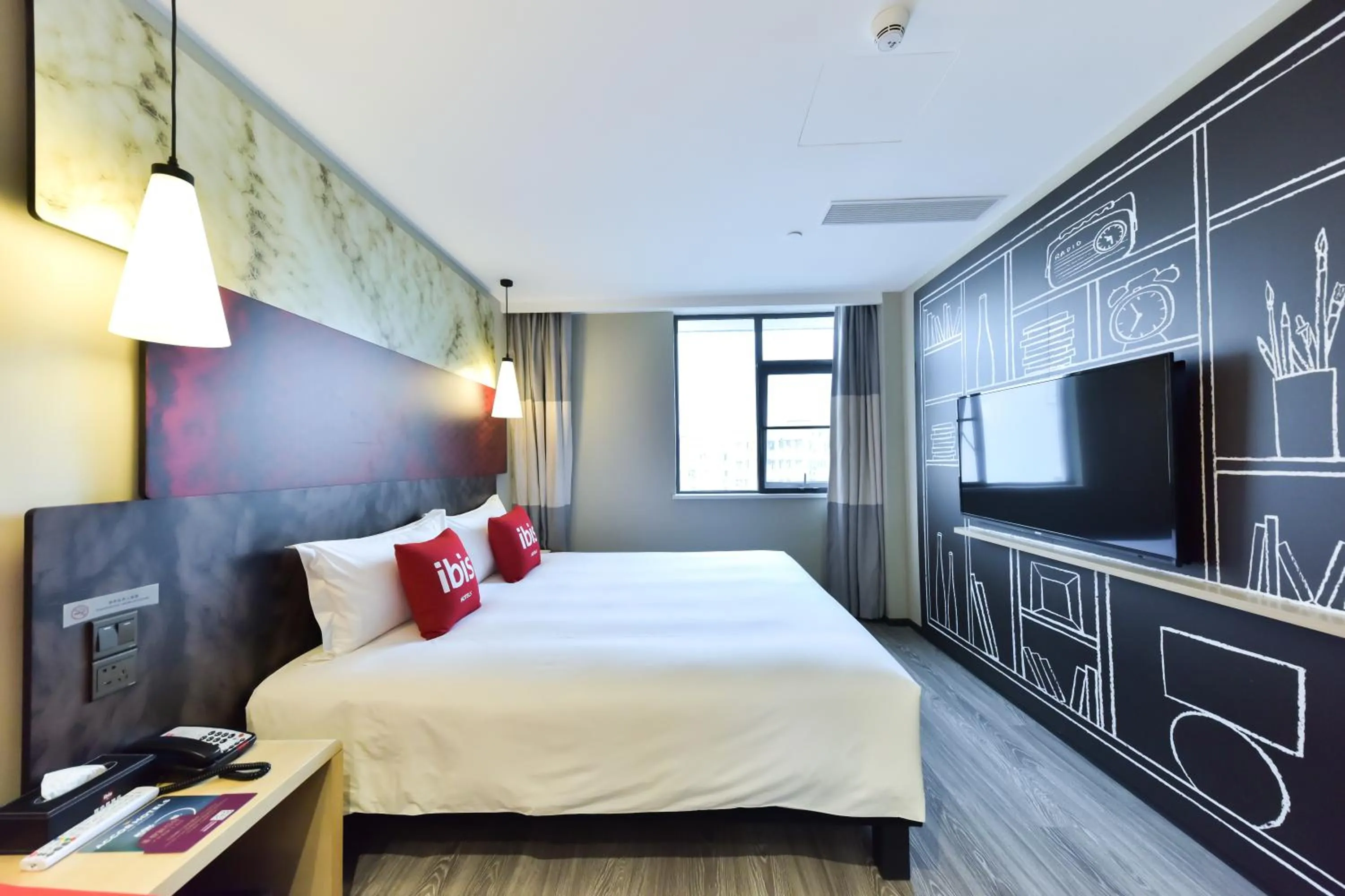 Bed in Ibis Guangzhou Pazhou International Exhibition Center Hotel