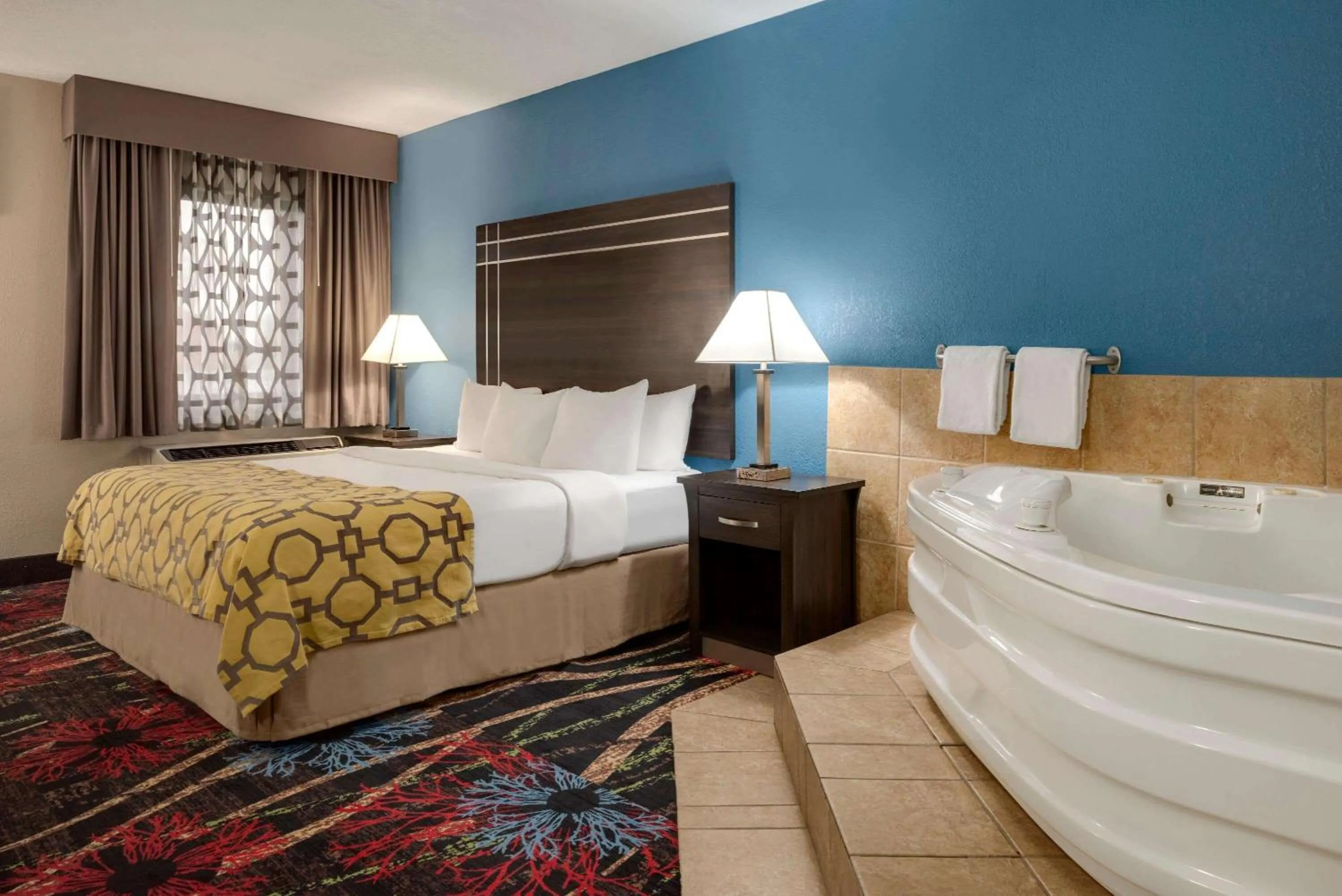 Photo of the whole room, Bed in Baymont by Wyndham Muncie Near Ball State University