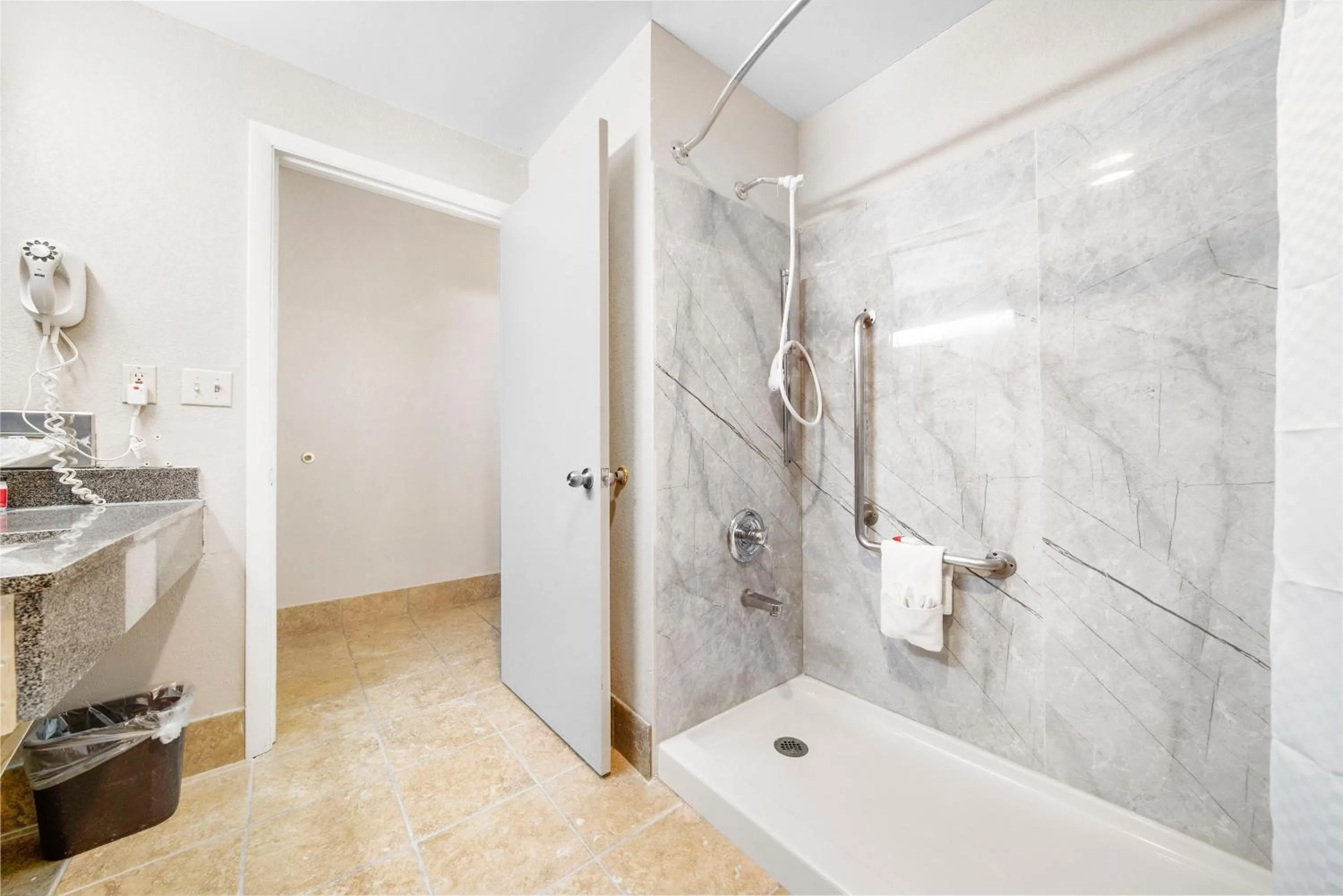 Bathroom in Baymont by Wyndham Muncie Near Ball State University