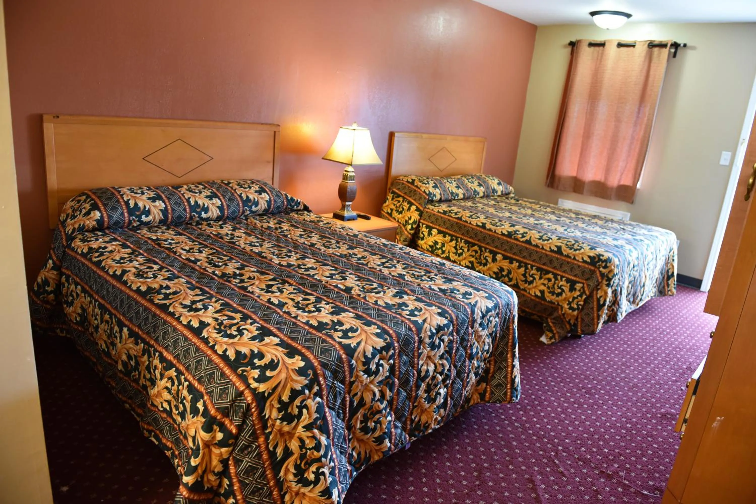 Bed in Knights Inn Merrillville