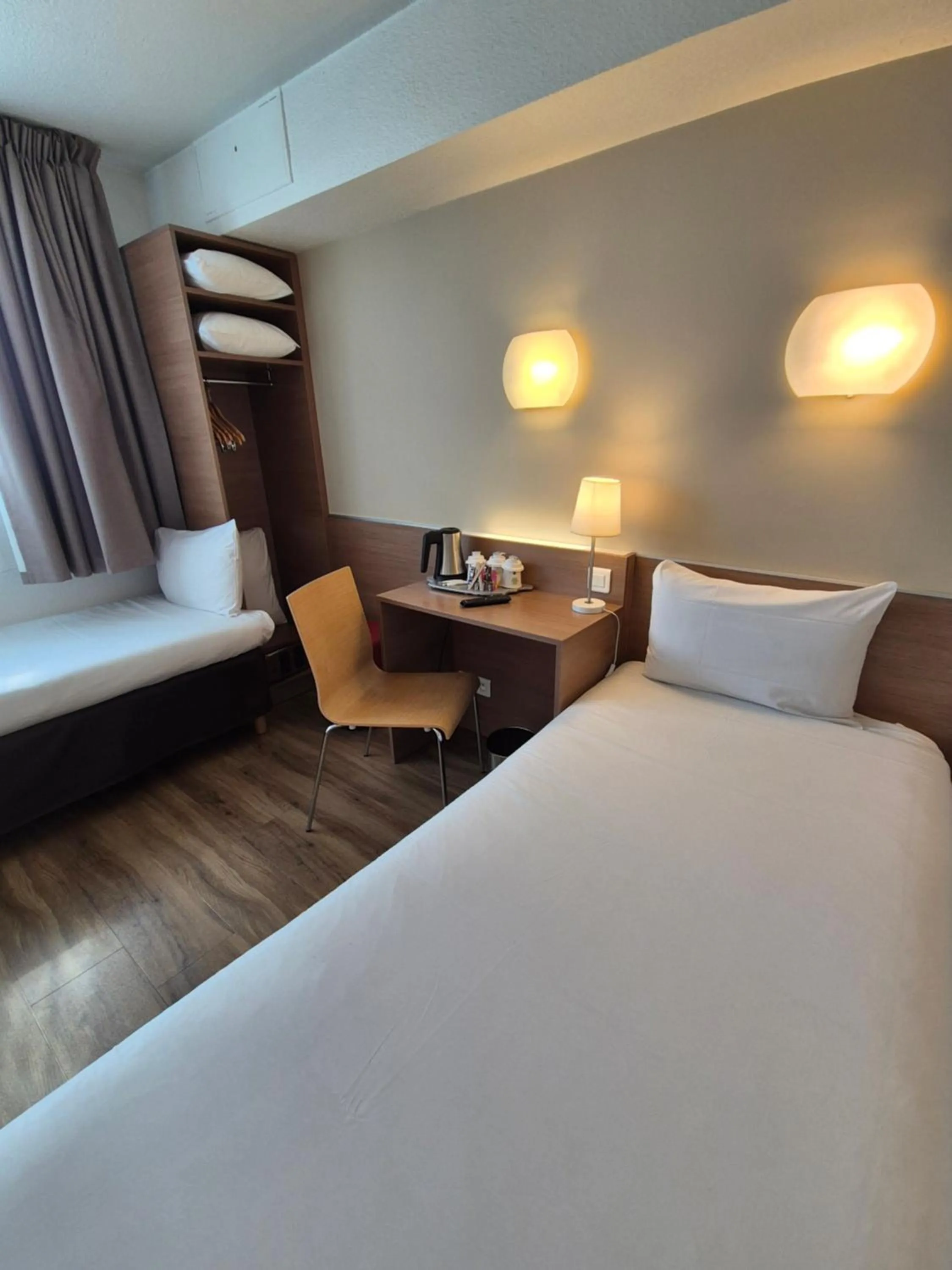 Bed in CAMPANILE PARIS 12 - Bercy Village