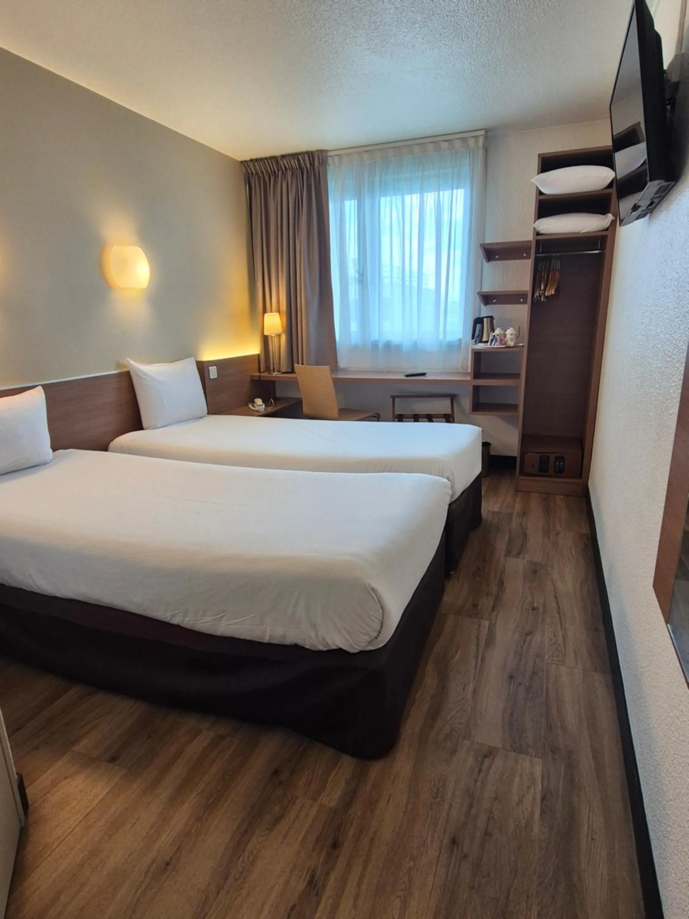 Photo of the whole room, Bed in CAMPANILE PARIS 12 - Bercy Village