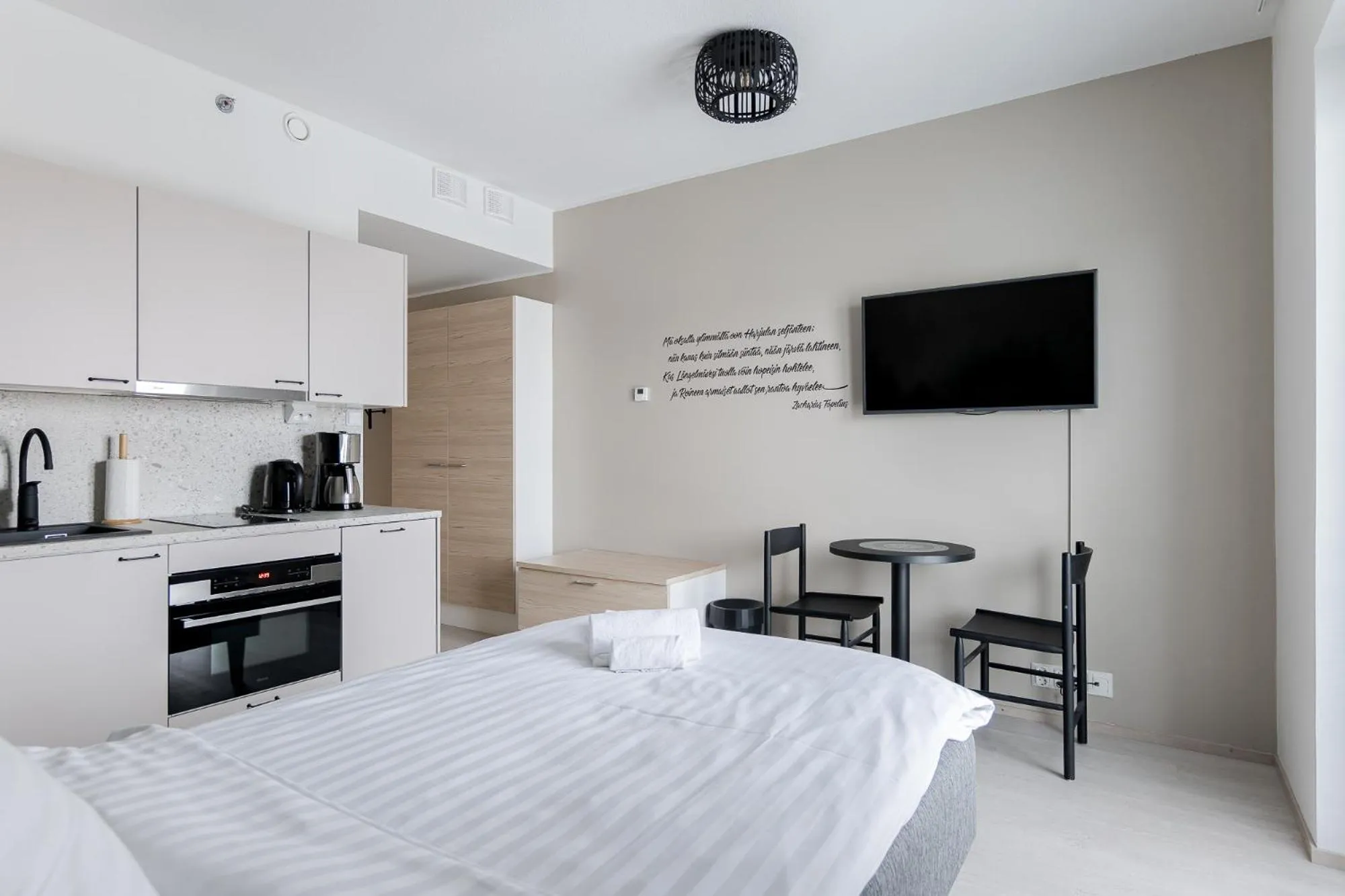 Bed in Hotelli Kuohu Kangasala - Hotel and Apartments by UHANDA