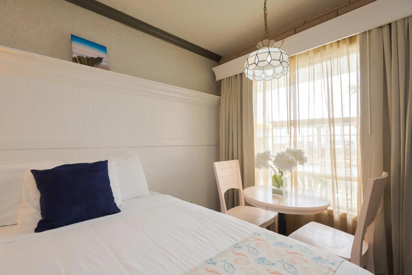 Bed in Gaido's Seaside Inn