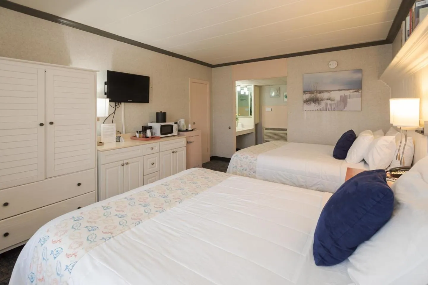 Bed in Gaido's Seaside Inn