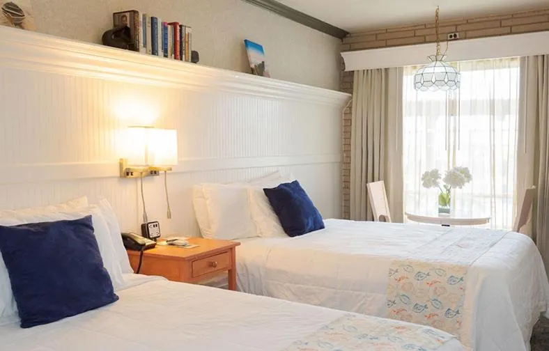 Bed in Gaido's Seaside Inn