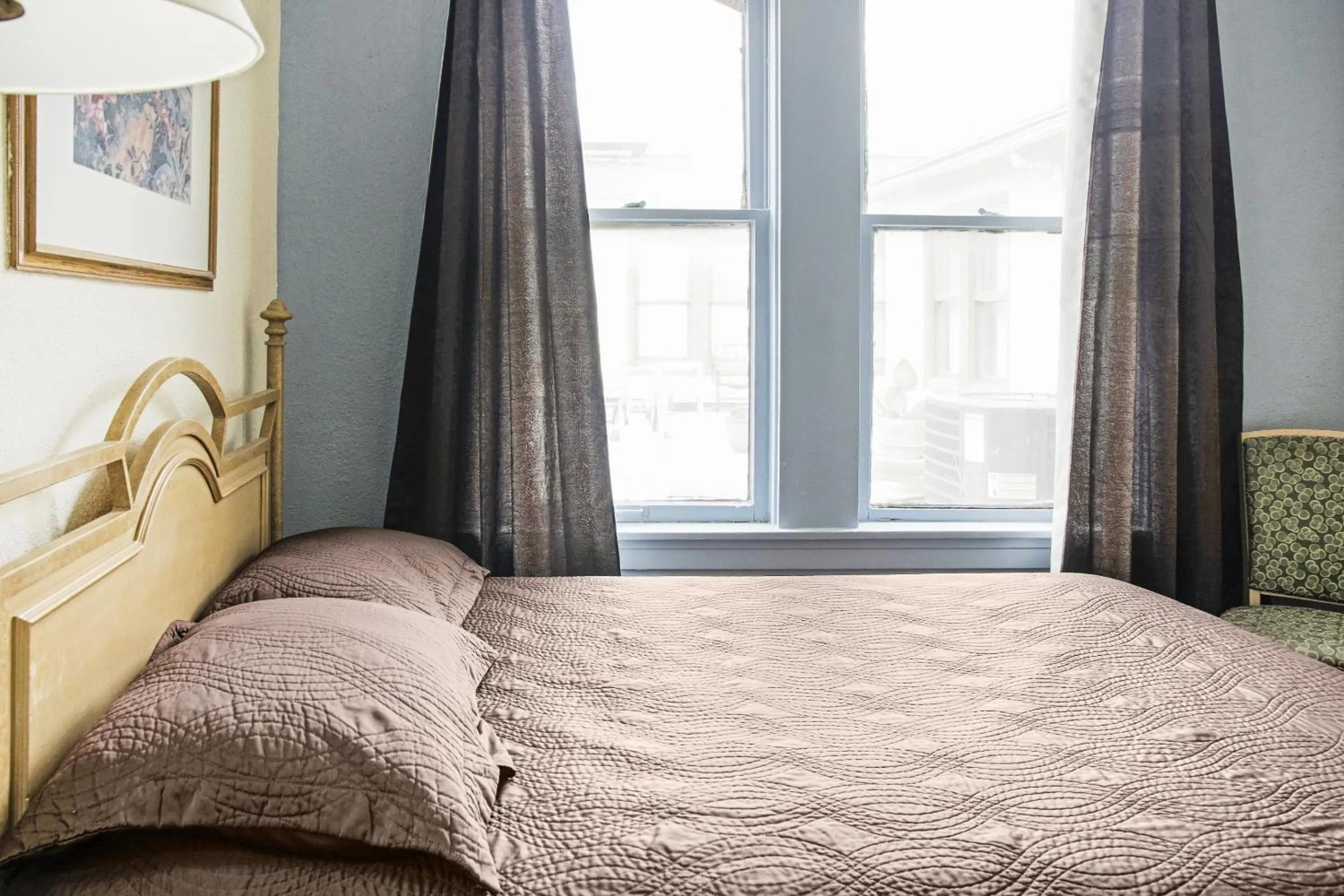 Bedroom, Bed in OYO Historic Cameron Hotel Brownsville I-69E