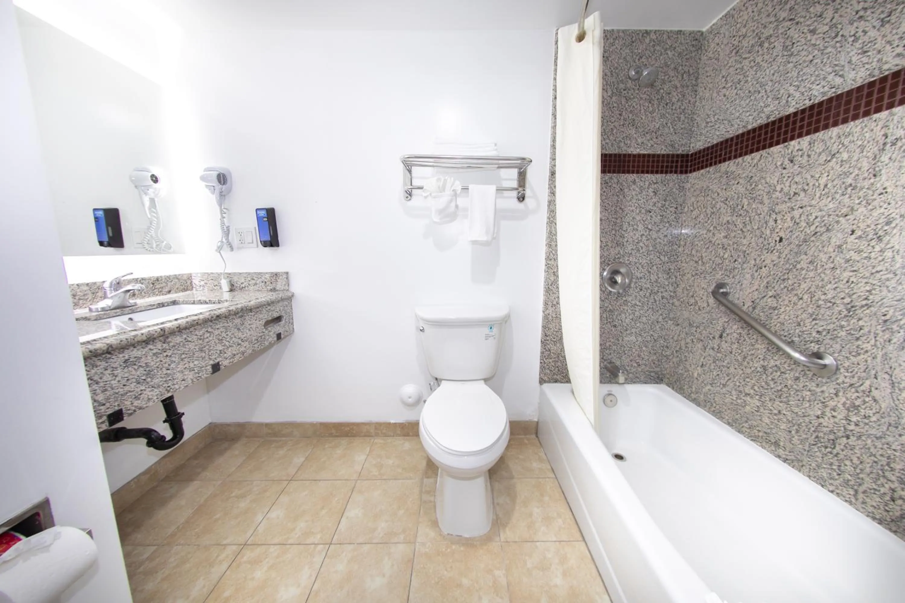 Bathroom in Rodeway Inn & Suites