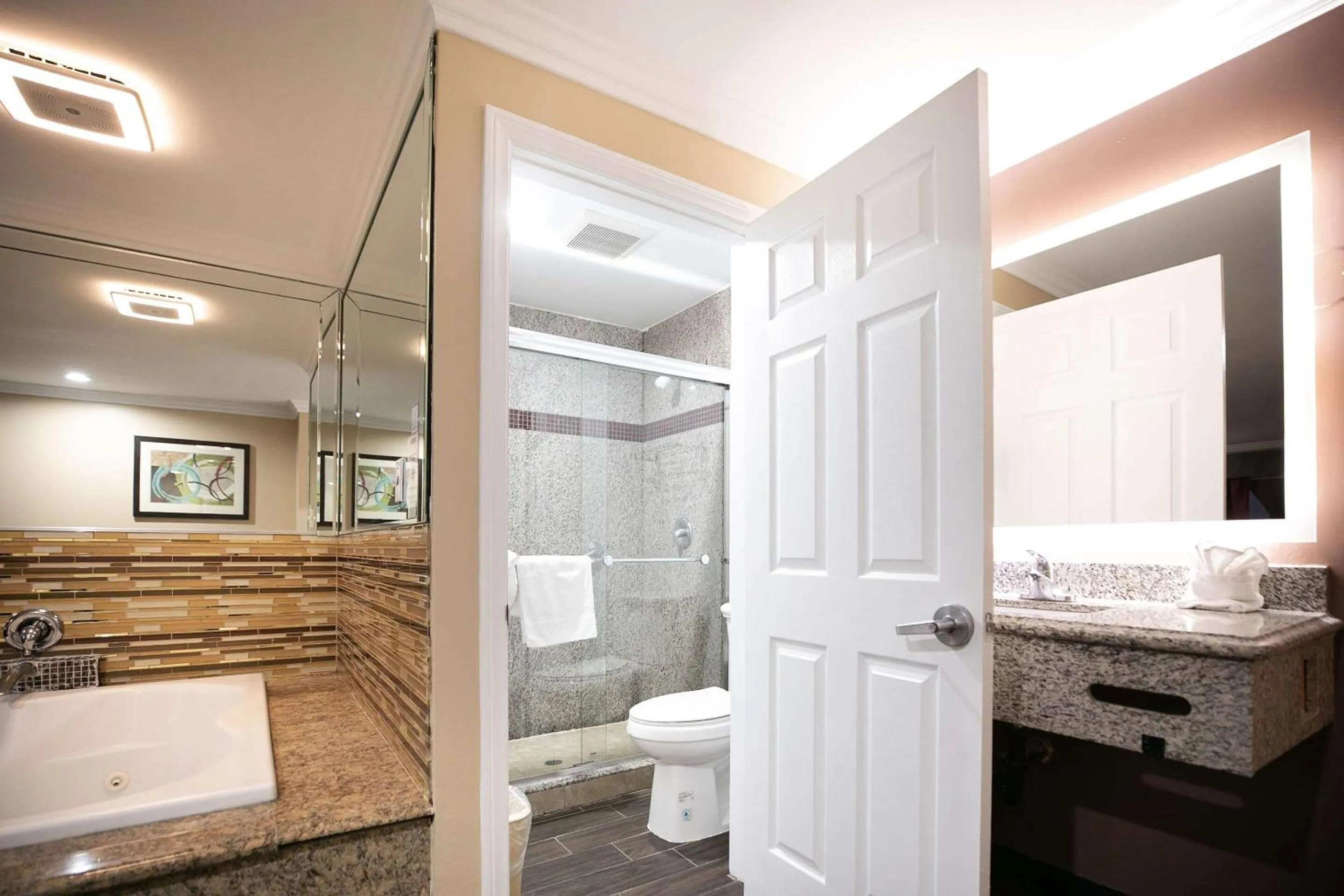 Bedroom in Rodeway Inn & Suites