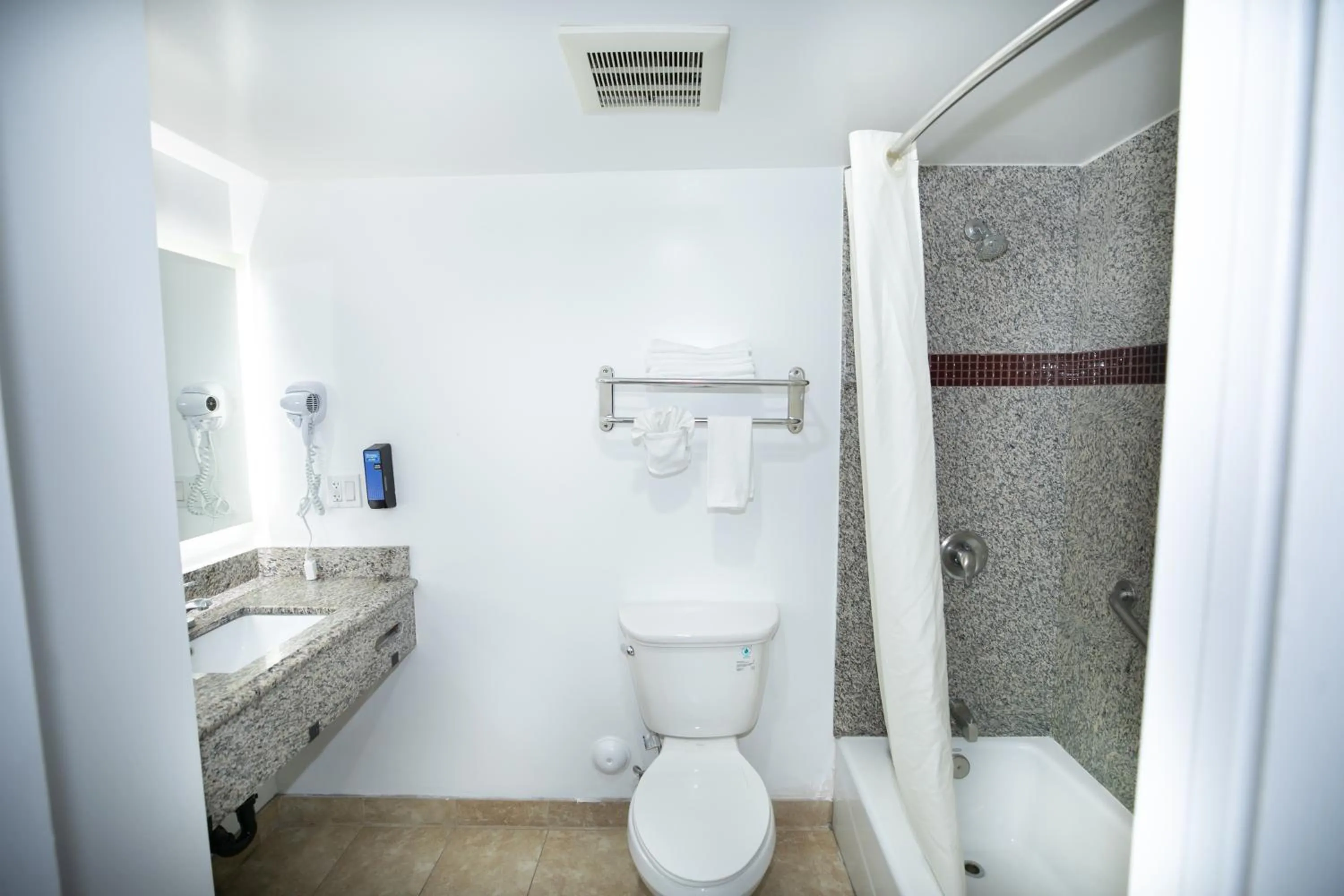 Bathroom in Rodeway Inn & Suites