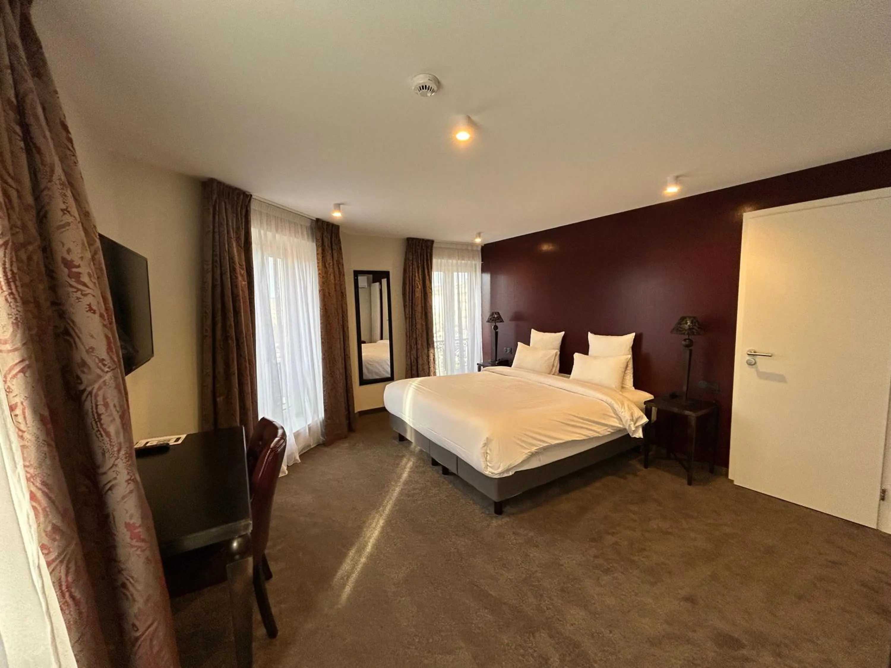 Bedroom in Hôtel Le Bristol Strasbourg Gare