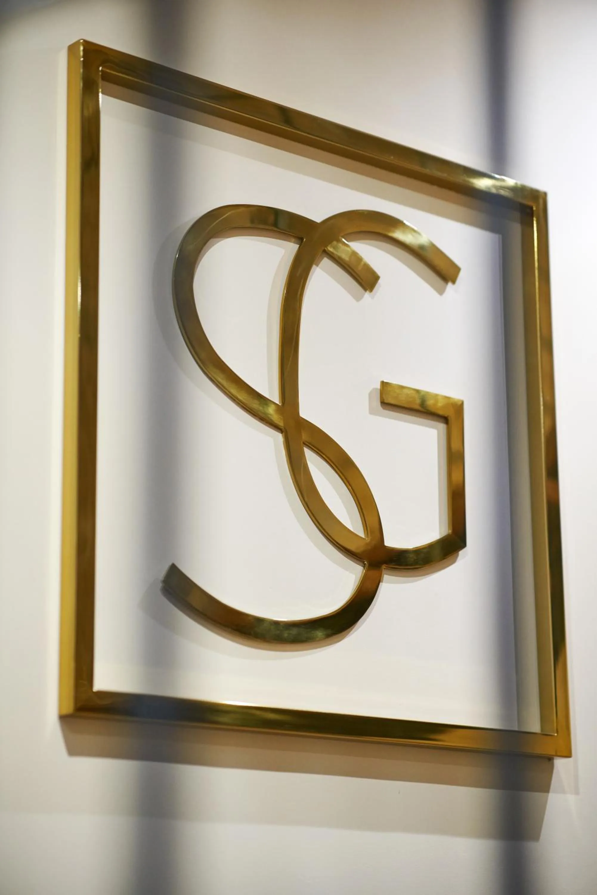 Property logo or sign in Signature Apartments Santa Catarina