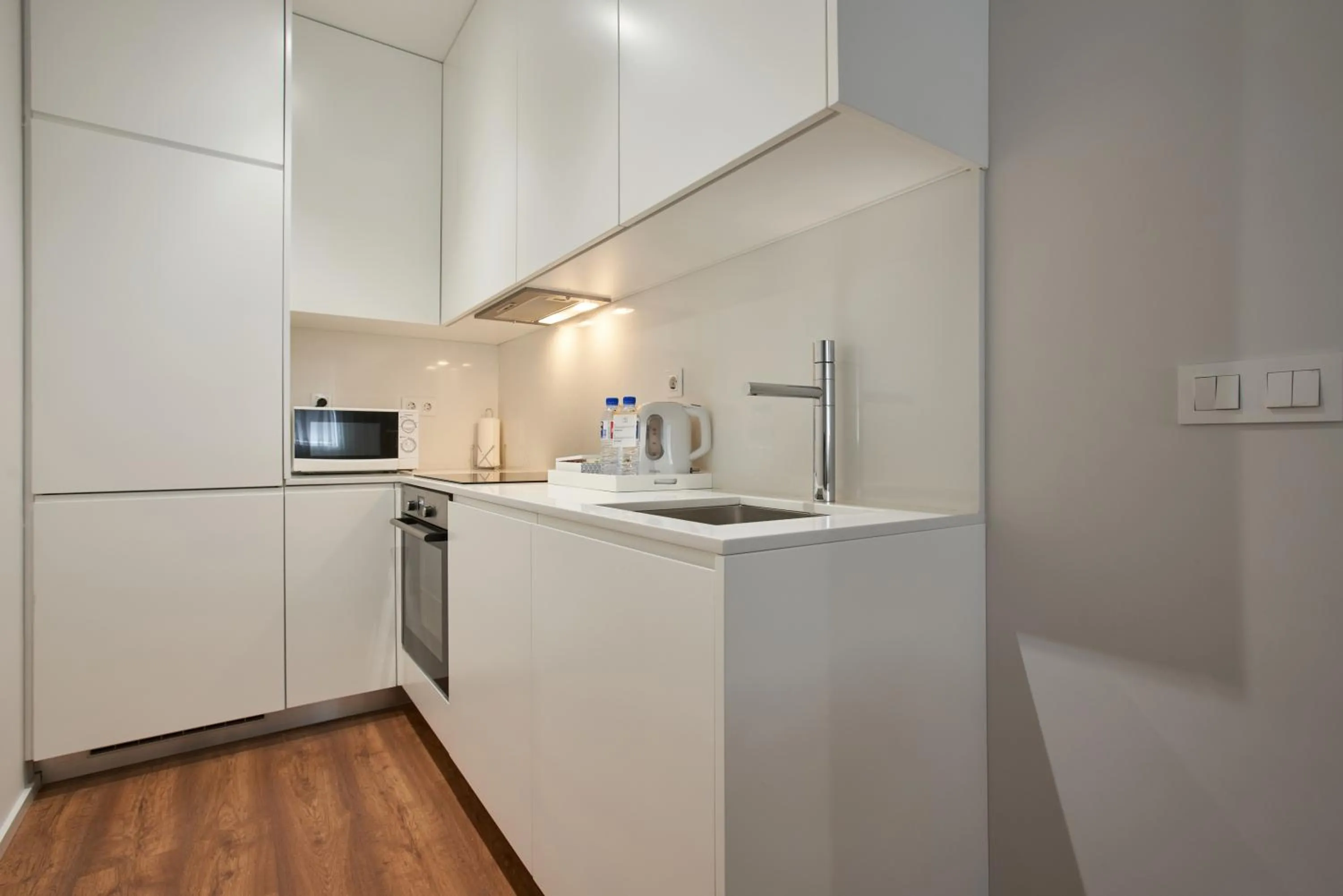 Kitchen or kitchenette in Signature Apartments Santa Catarina