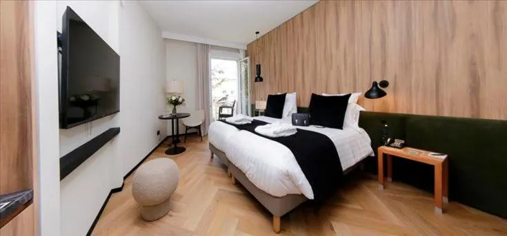 Bed in Le Richebourg Hôtel, Restaurant & Spa