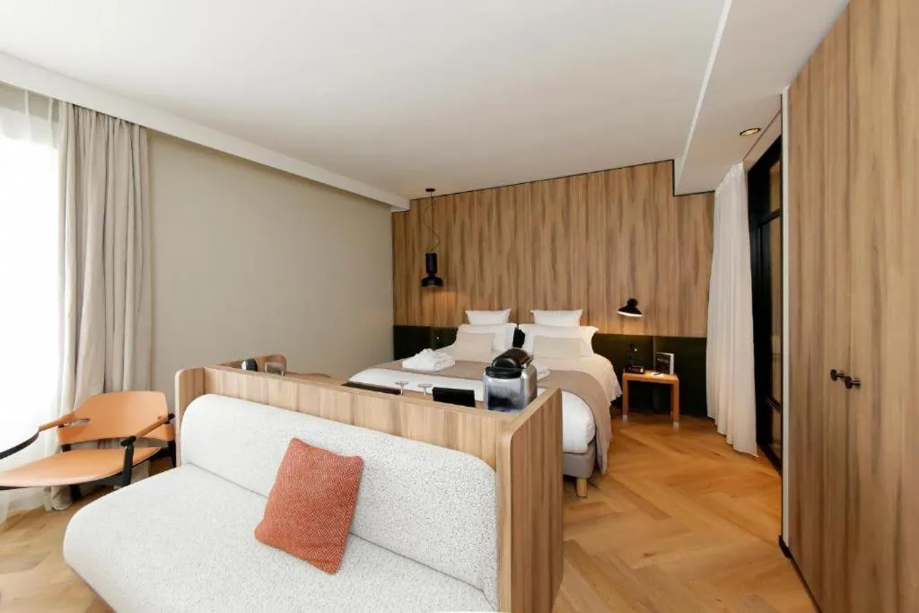 Bed in Le Richebourg Hôtel, Restaurant & Spa