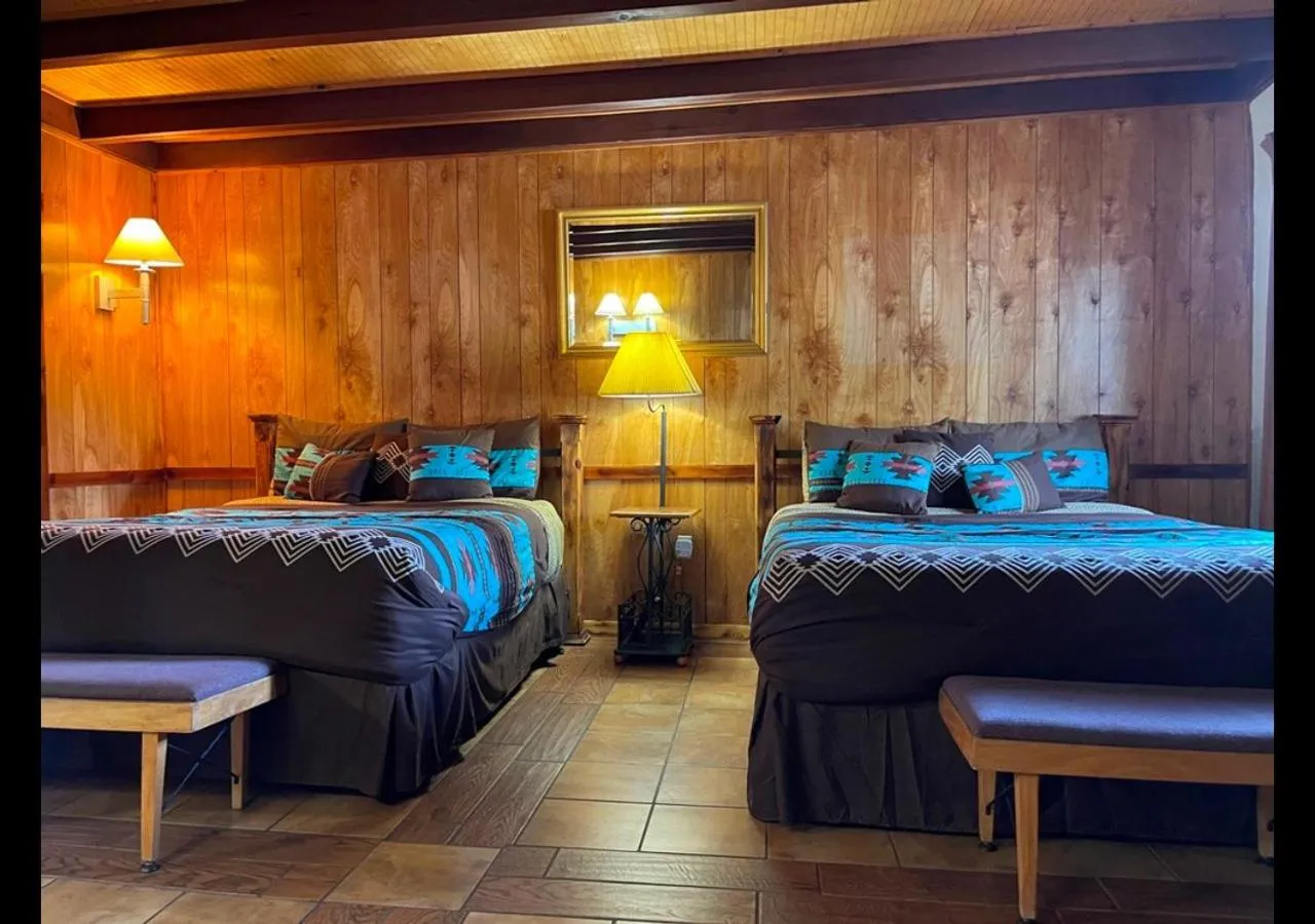 Bed in West Winds Lodge