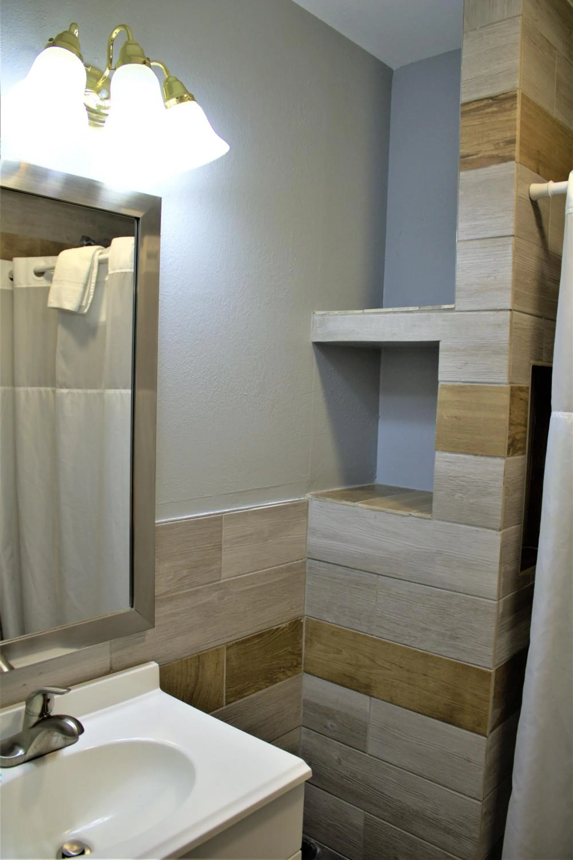 Bathroom in Hometowne Inn & Suites