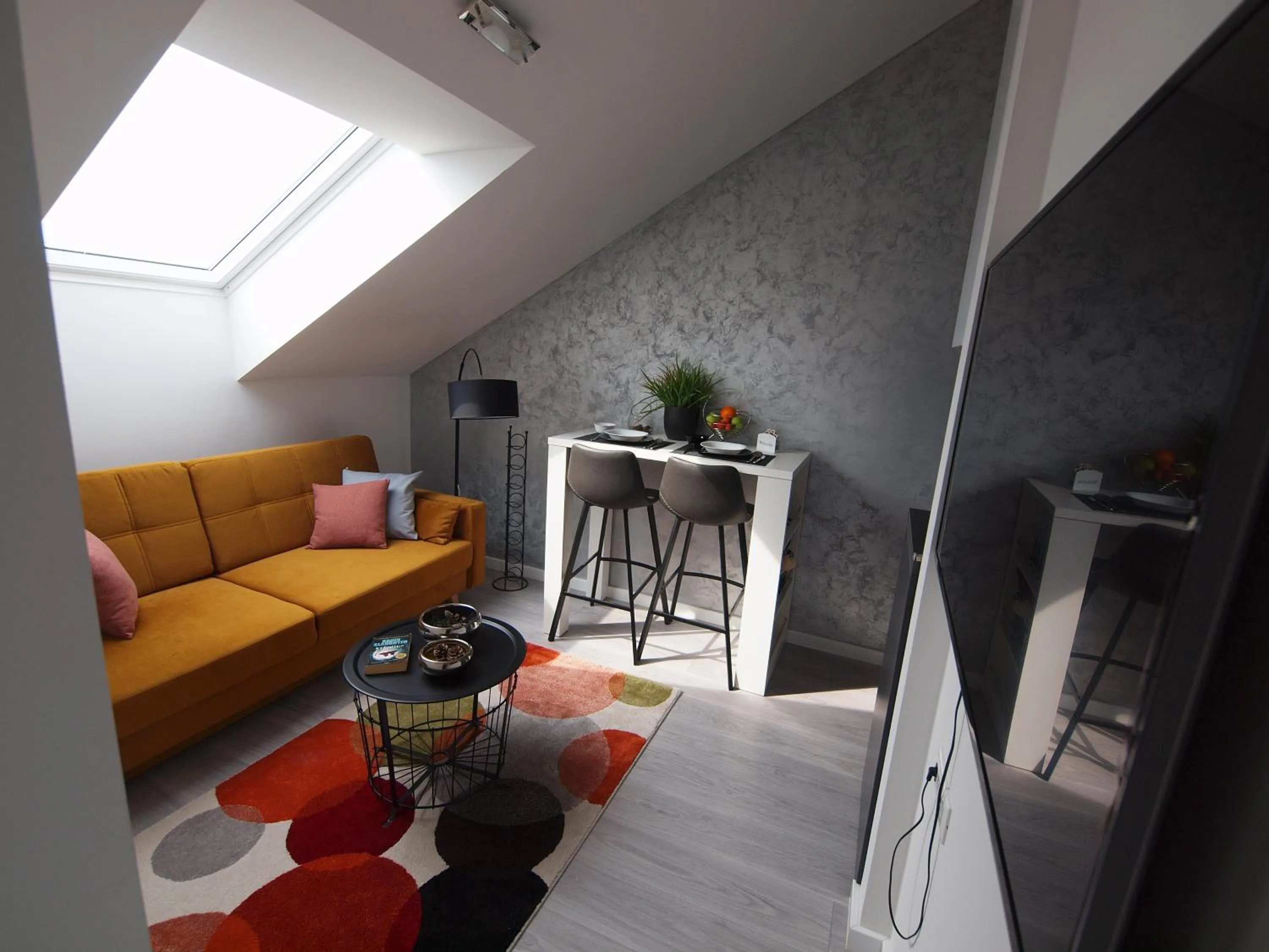 Living room in Apartments Mak & Lux - sea & sunset top view